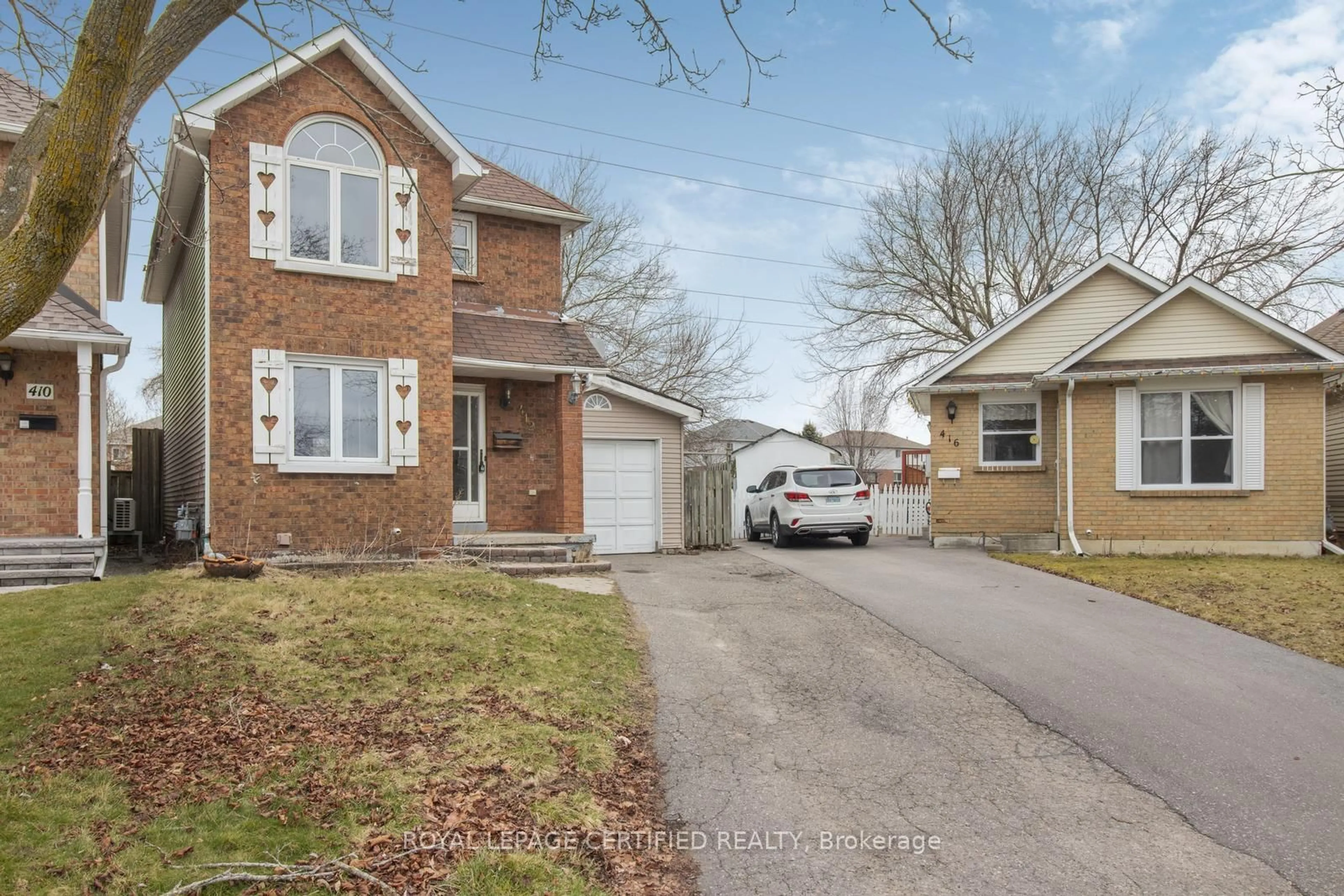 Home with brick exterior material, street for 412 Pompano Crt, Oshawa Ontario L1K 1M9