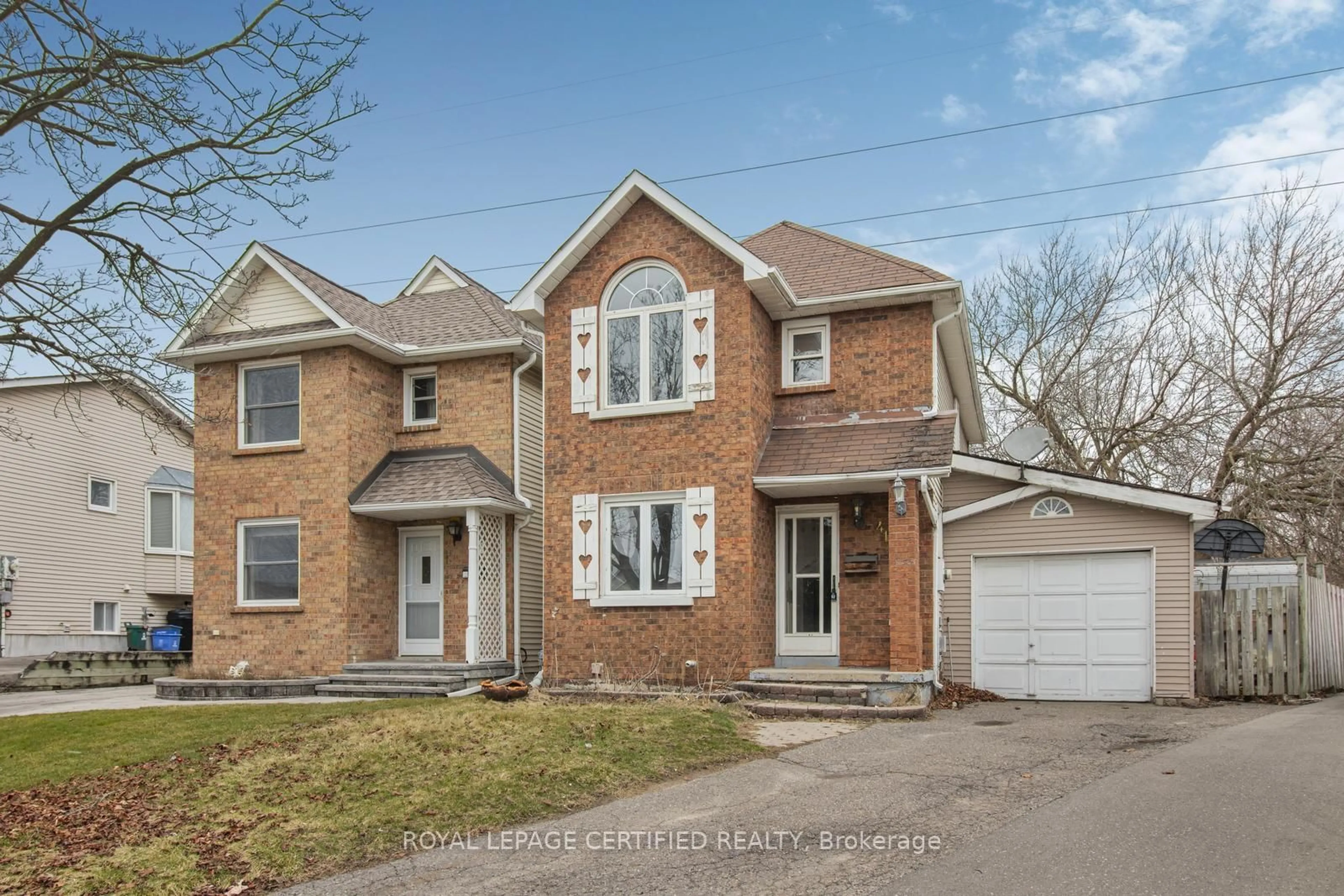 Home with brick exterior material, street for 412 Pompano Crt, Oshawa Ontario L1K 1M9
