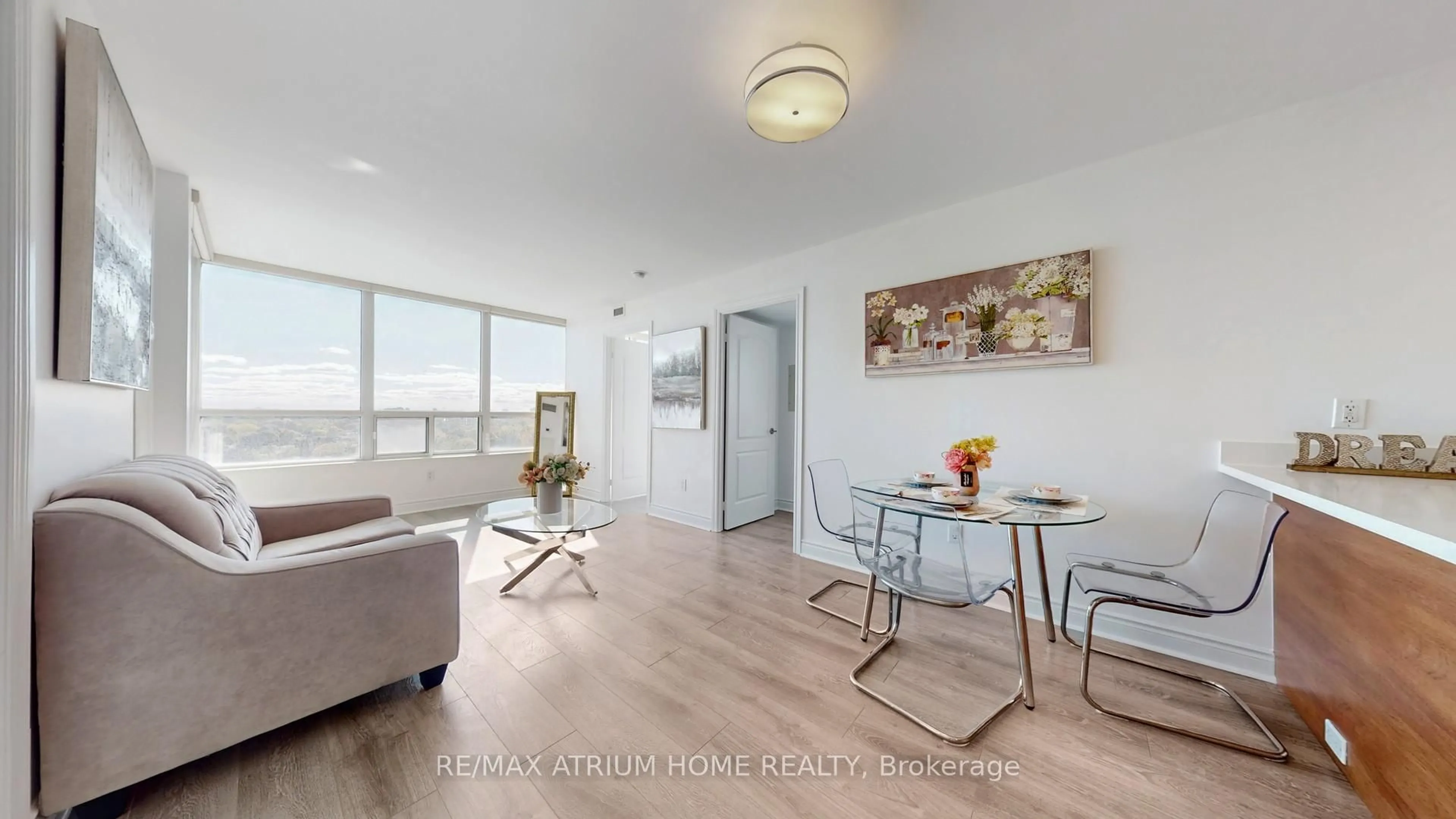 Living room with furniture, wood/laminate floor for 60 Brian Harrison Way #1209, Toronto Ontario M1P 5J4