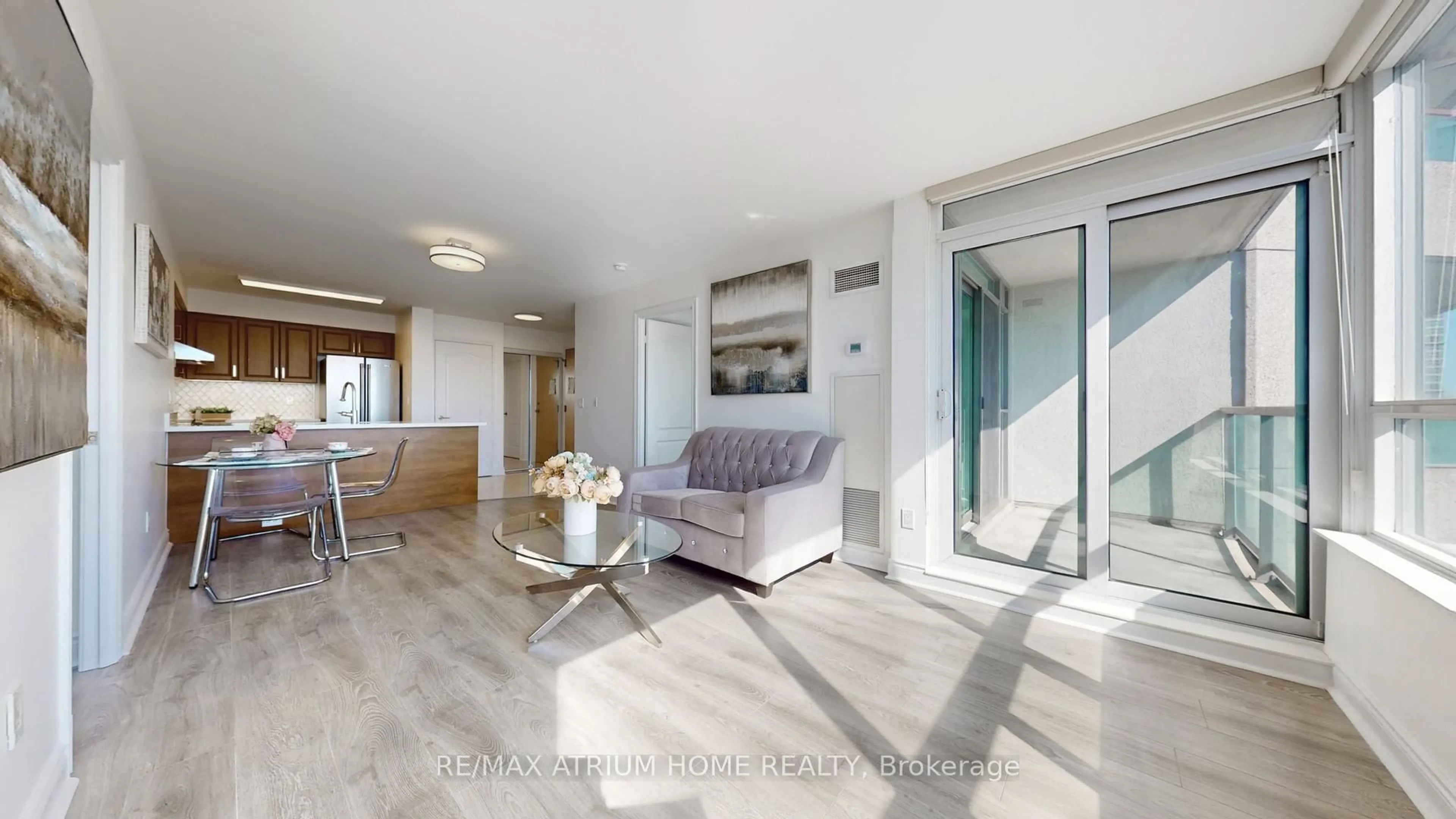 Living room with furniture, wood/laminate floor for 60 Brian Harrison Way #1209, Toronto Ontario M1P 5J4