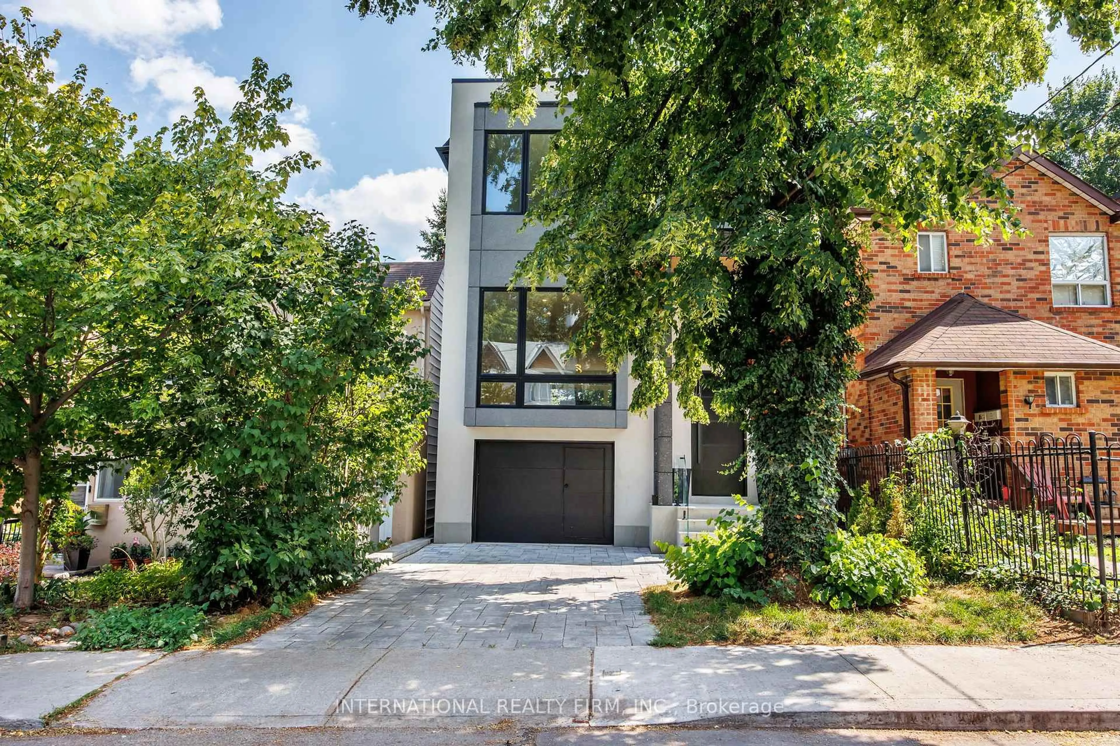 Home with brick exterior material, street for 19 Ivy Ave, Toronto Ontario M4L 2H6