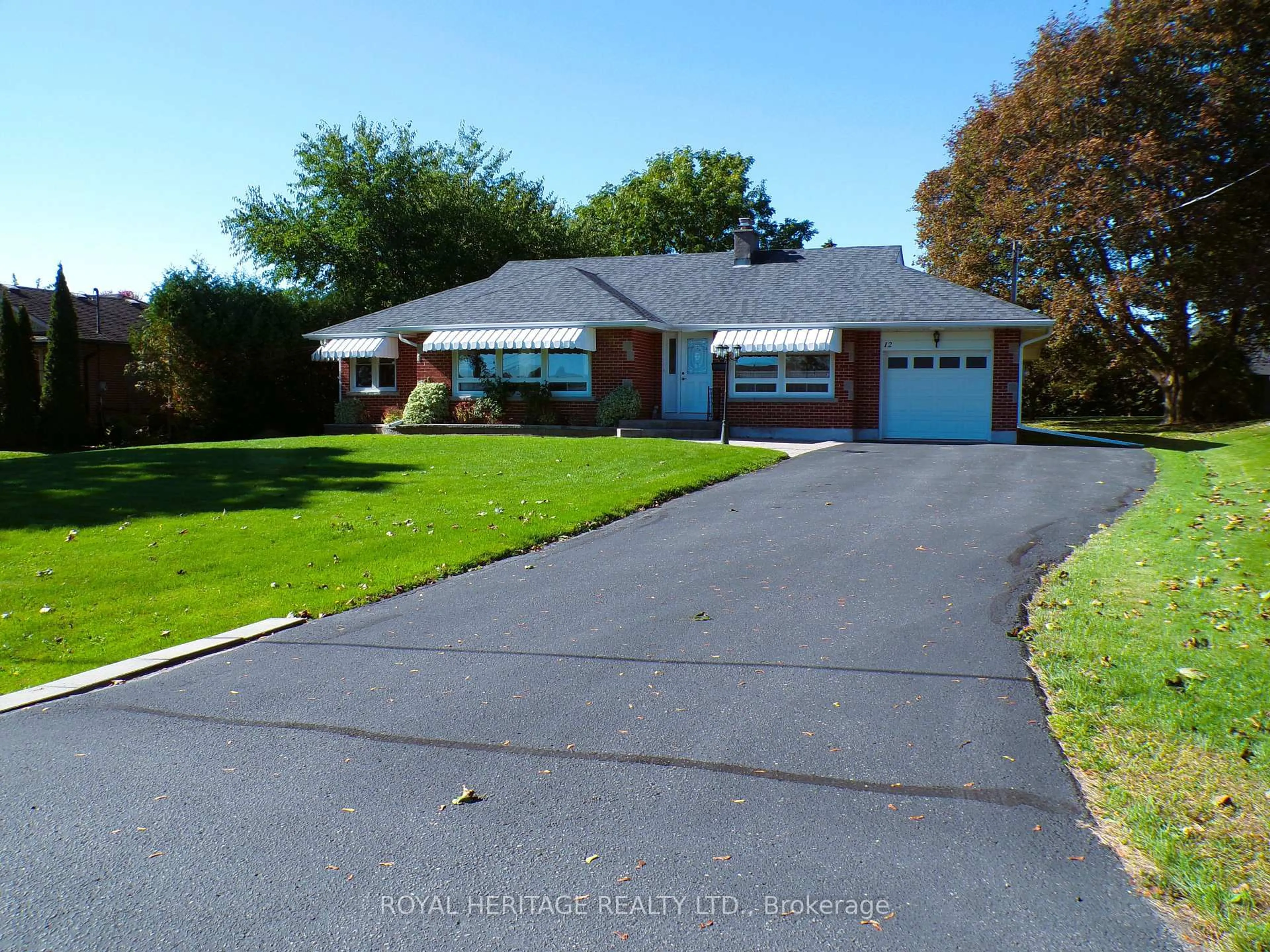 A pic from outside/outdoor area/front of a property/back of a property/a pic from drone, street for 12 Darlington Blvd, Clarington Ontario L1E 2J7