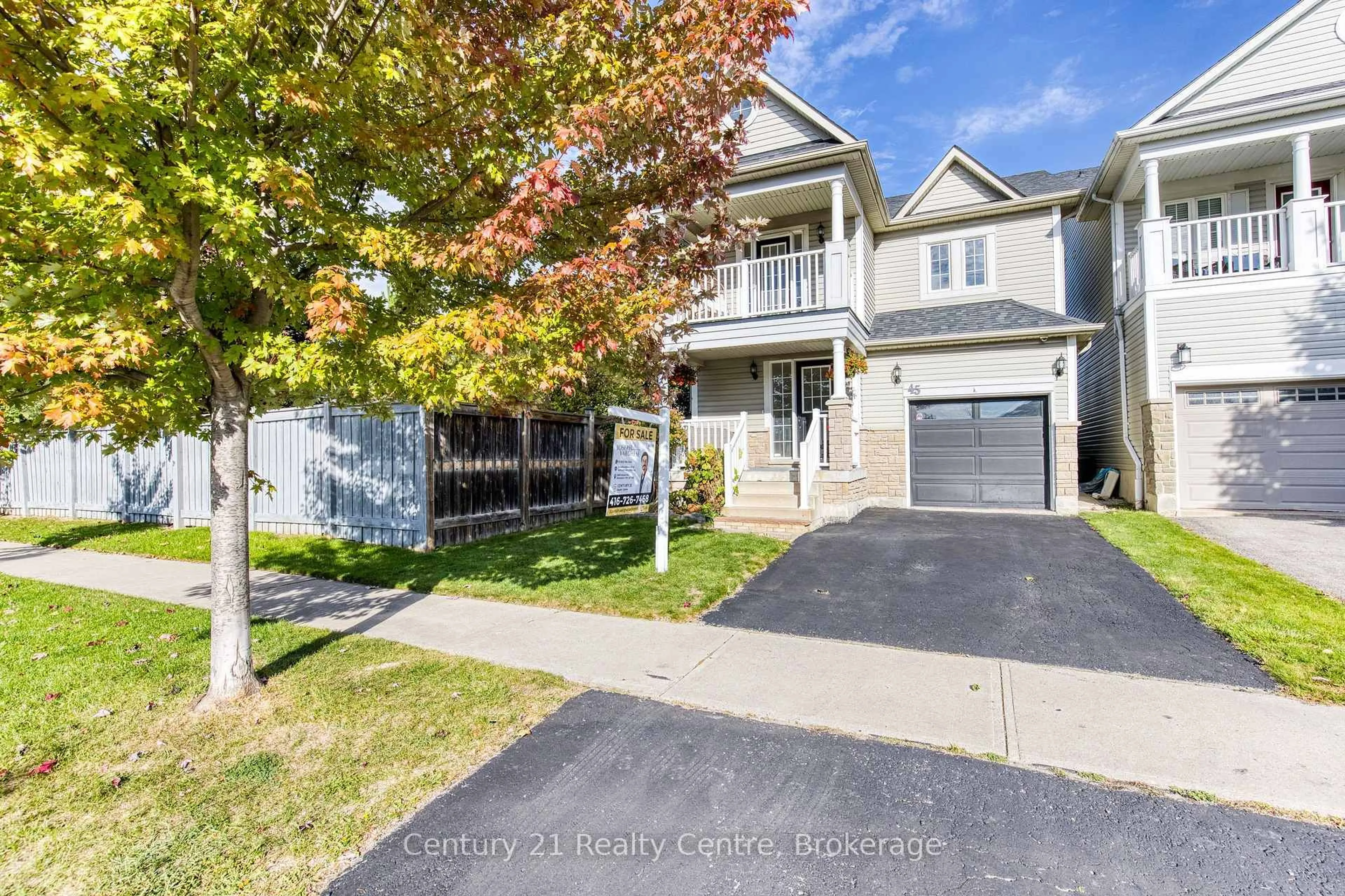 Home with vinyl exterior material, street for 45 Hatch St, Whitby Ontario L1M 2H9