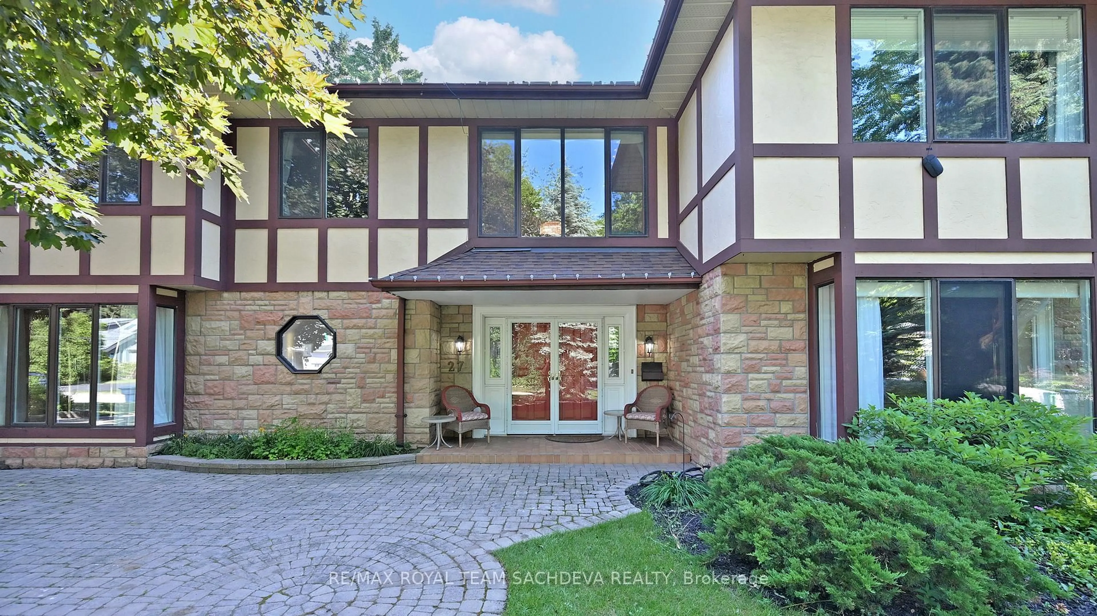 Home with brick exterior material, street for 27 Orchard Park Dr, Toronto Ontario M1E 3T6