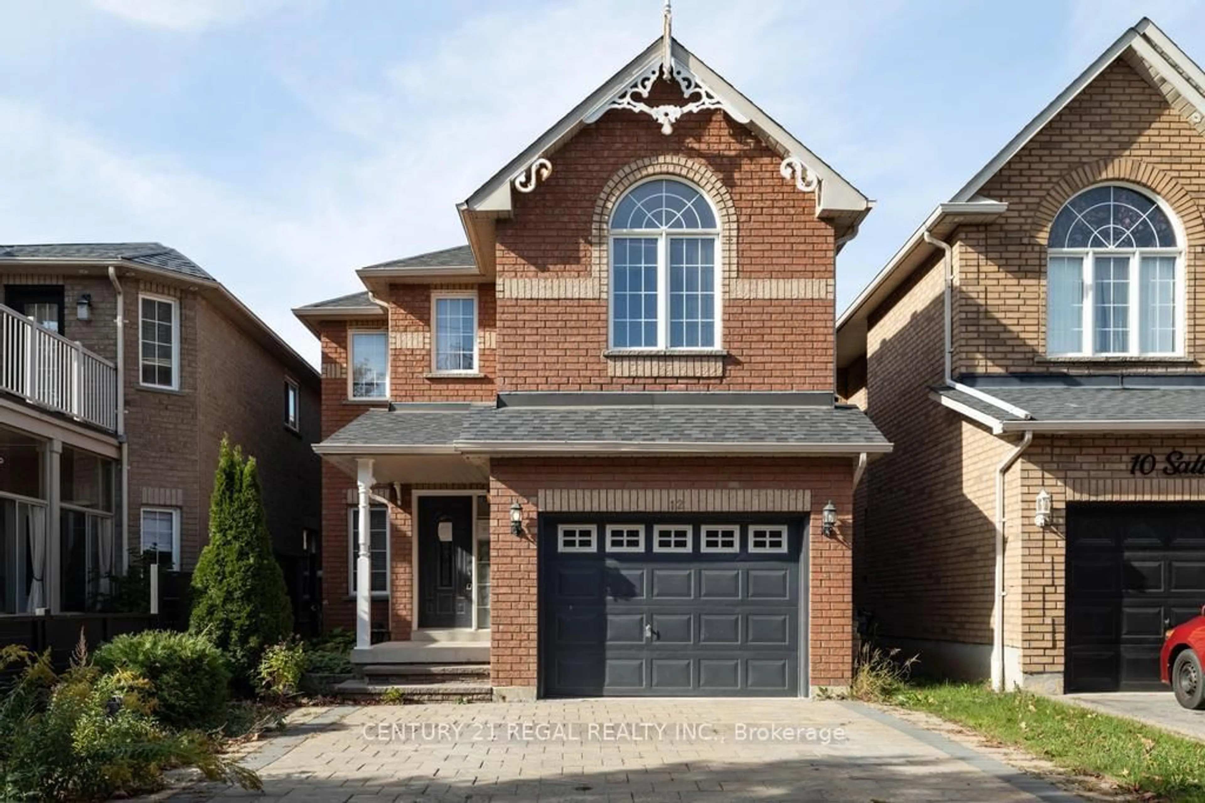 Home with brick exterior material, street for 12 Salt Dr, Ajax Ontario L1S 7P3