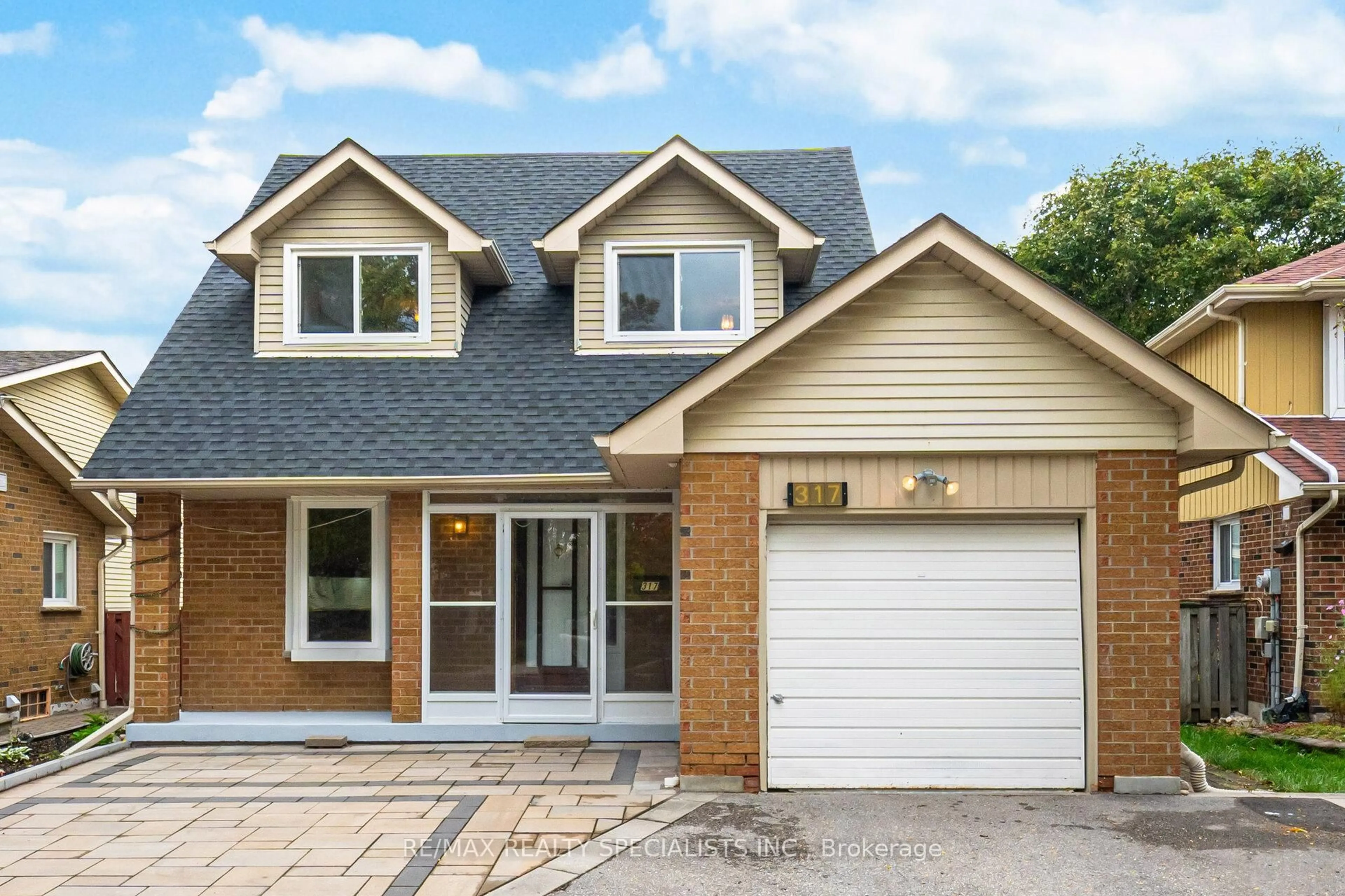 Home with brick exterior material, street for 317 Port Royal Tr, Toronto Ontario M1V 2L1