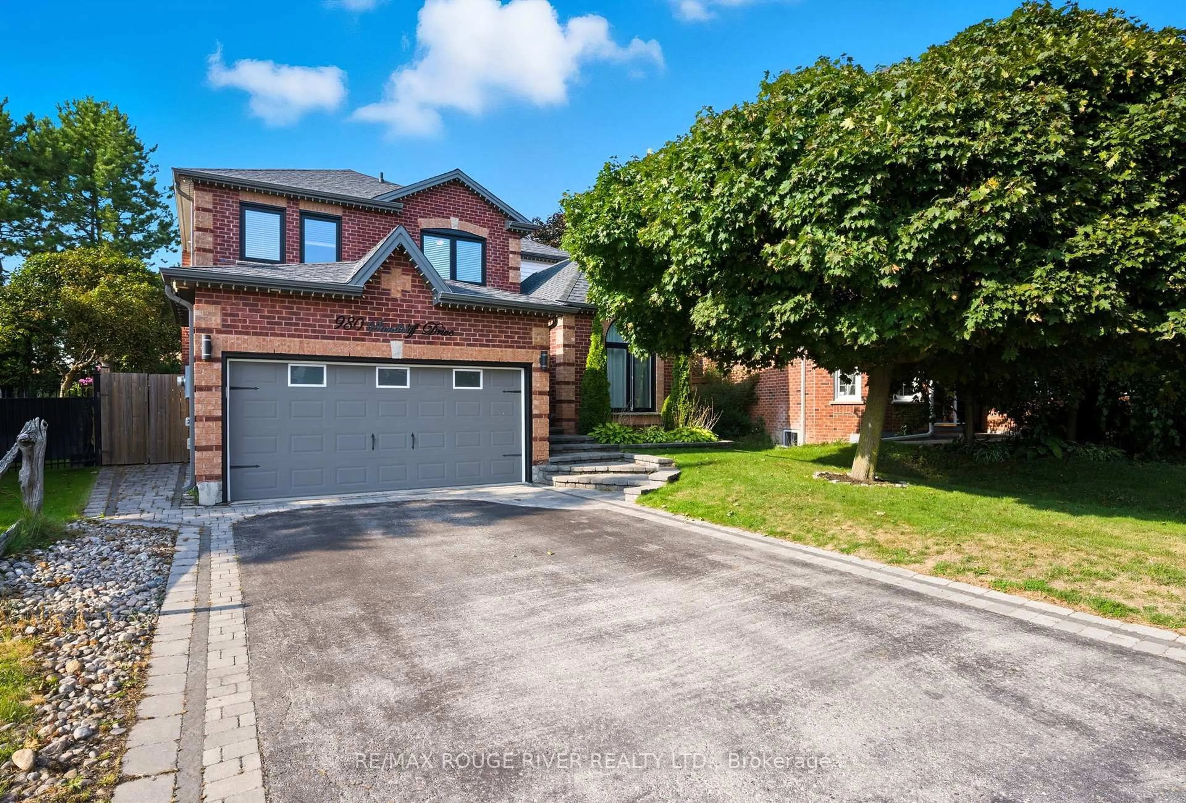 Home with brick exterior material, street for 980 Sandcliff Dr, Oshawa Ontario L1K 2E4