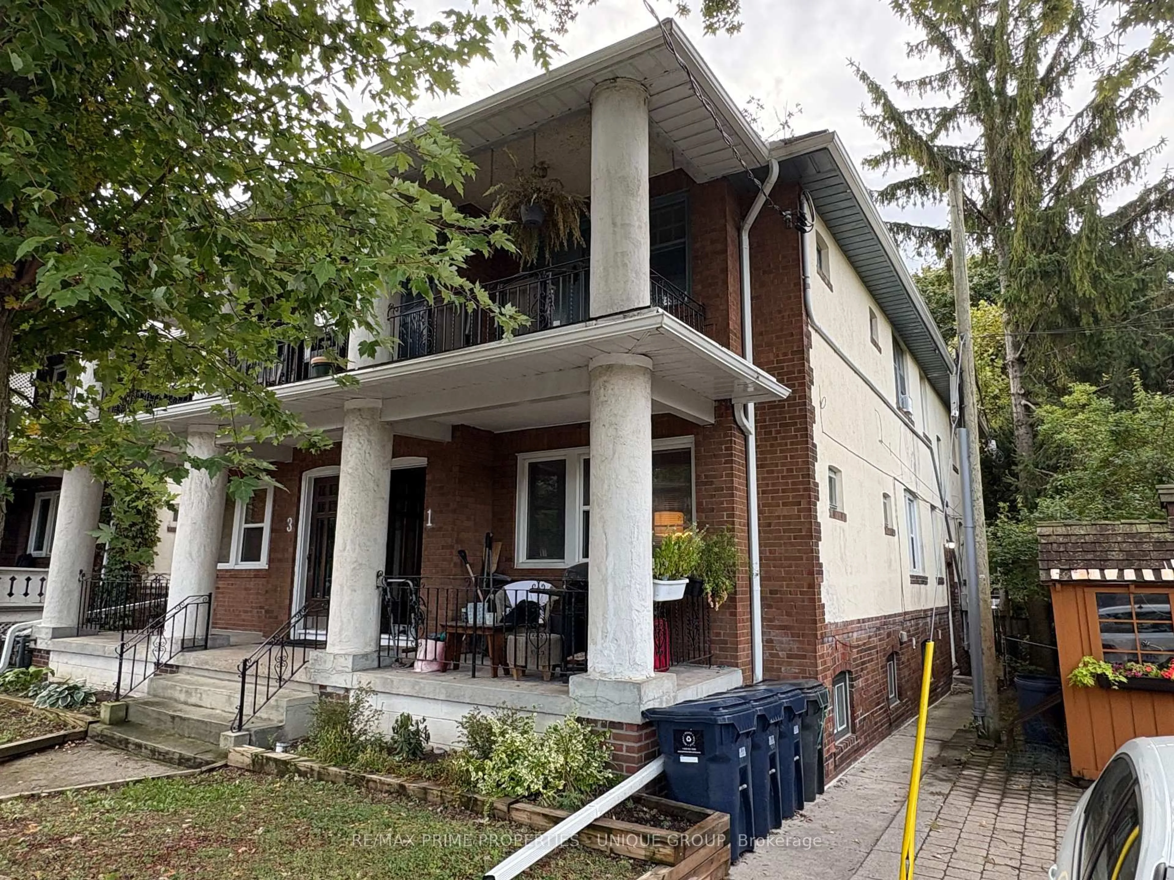 Home with brick exterior material, building for 1 Bonfield Ave, Toronto Ontario M4E 1B9