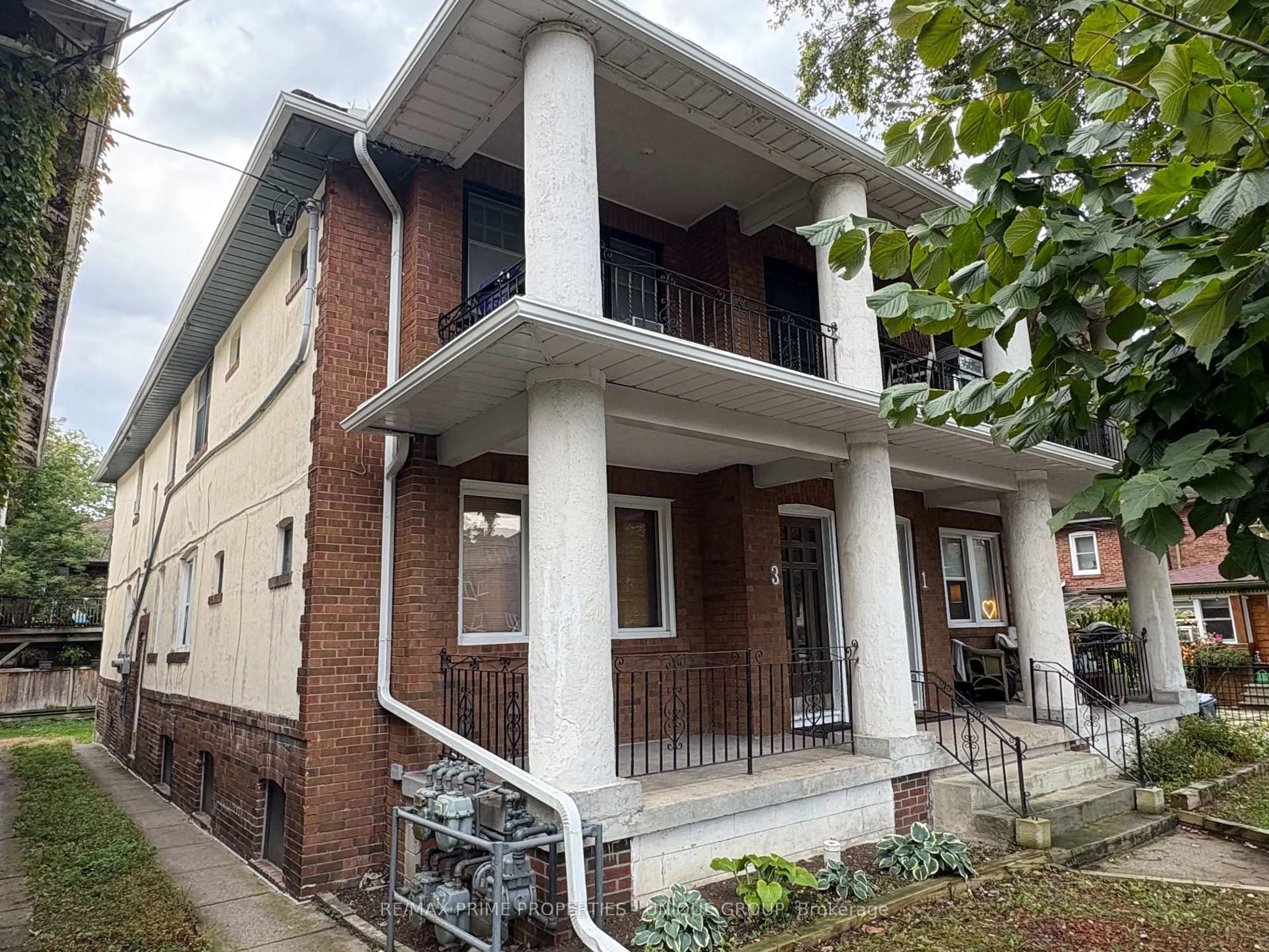 Home with brick exterior material, street for 1 Bonfield Ave, Toronto Ontario M4E 1B9