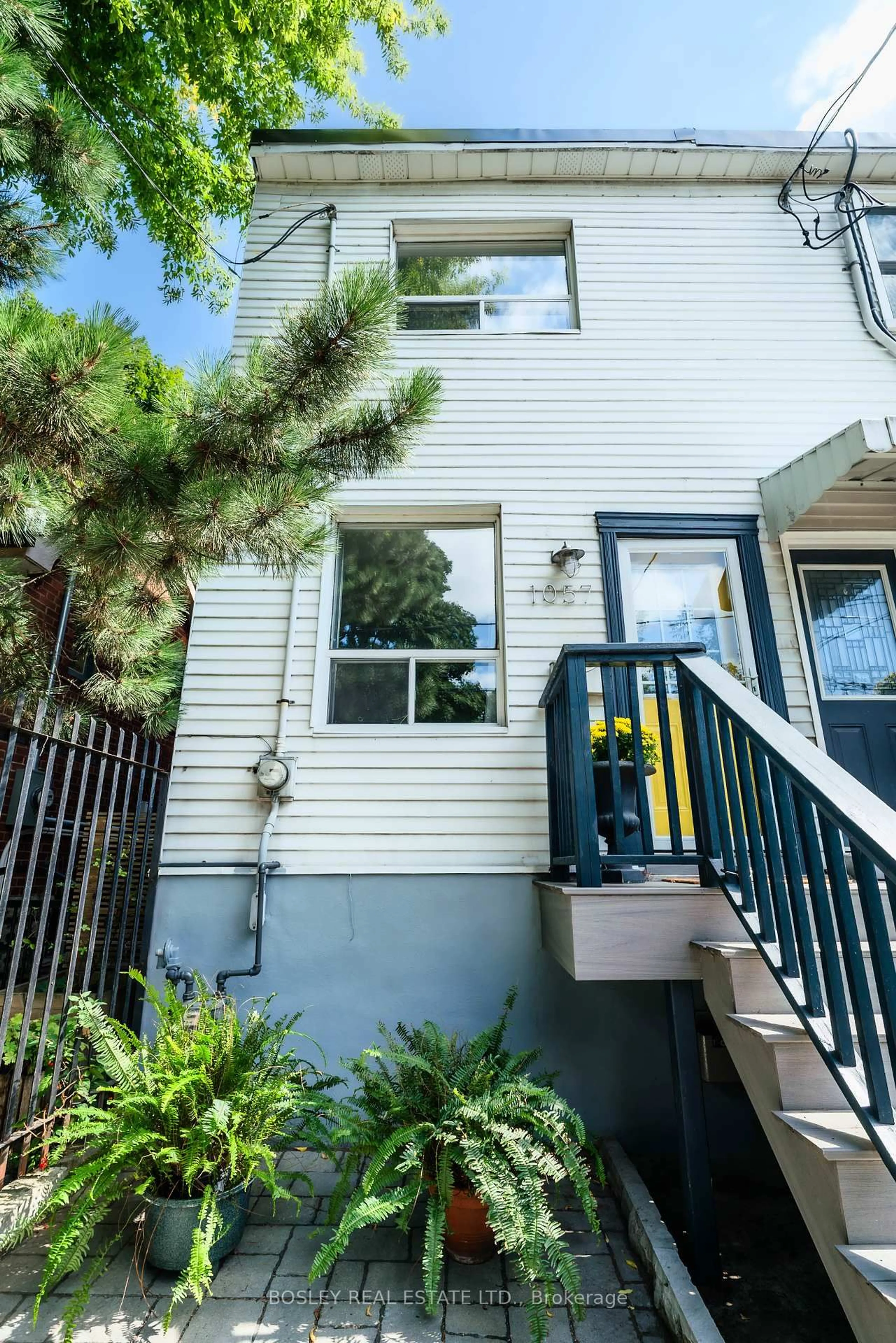 Home with vinyl exterior material, street for 1057 Craven Rd, Toronto Ontario M4J 4V7