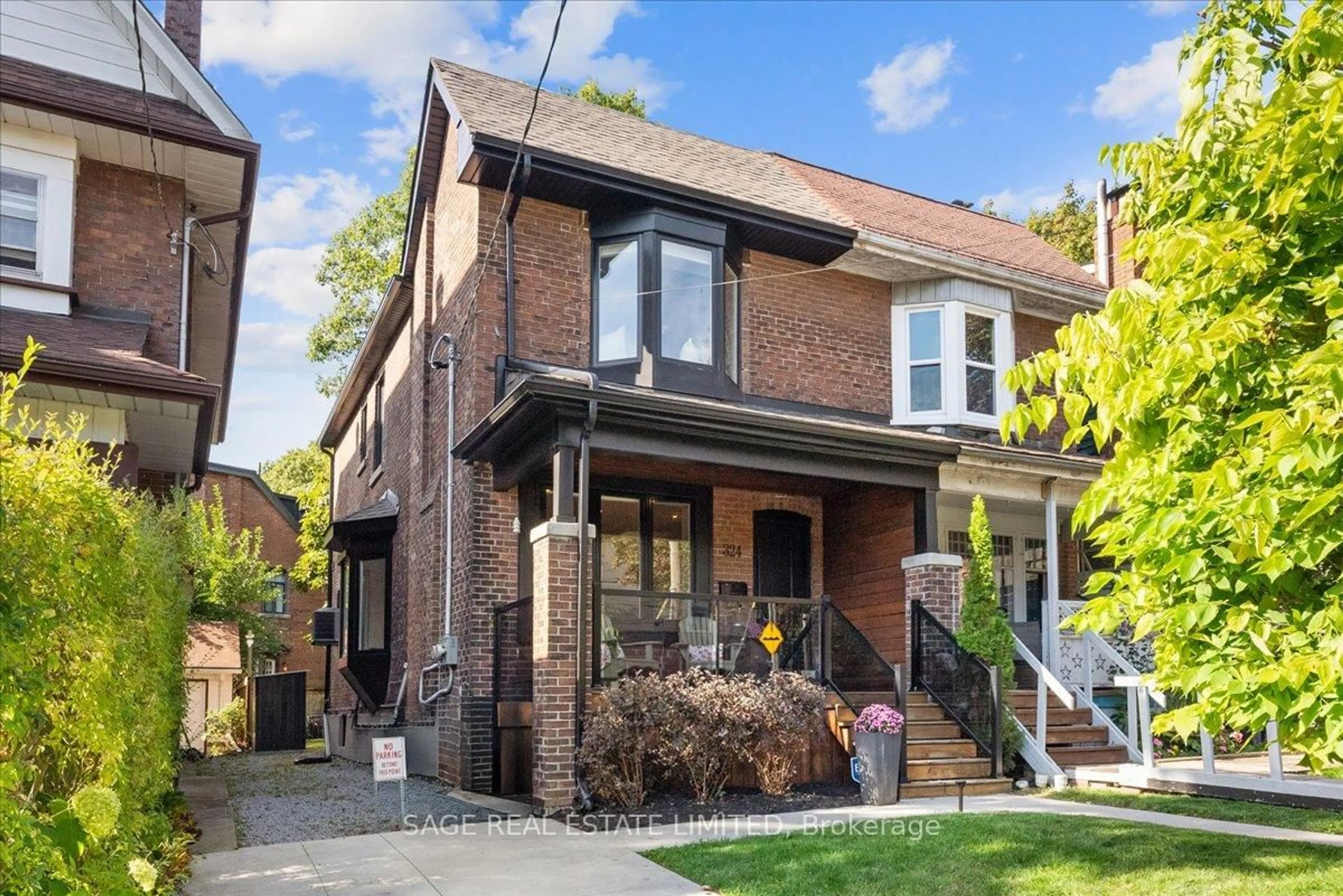Home with brick exterior material, street for 324 Beech Ave, Toronto Ontario M4E 3J3