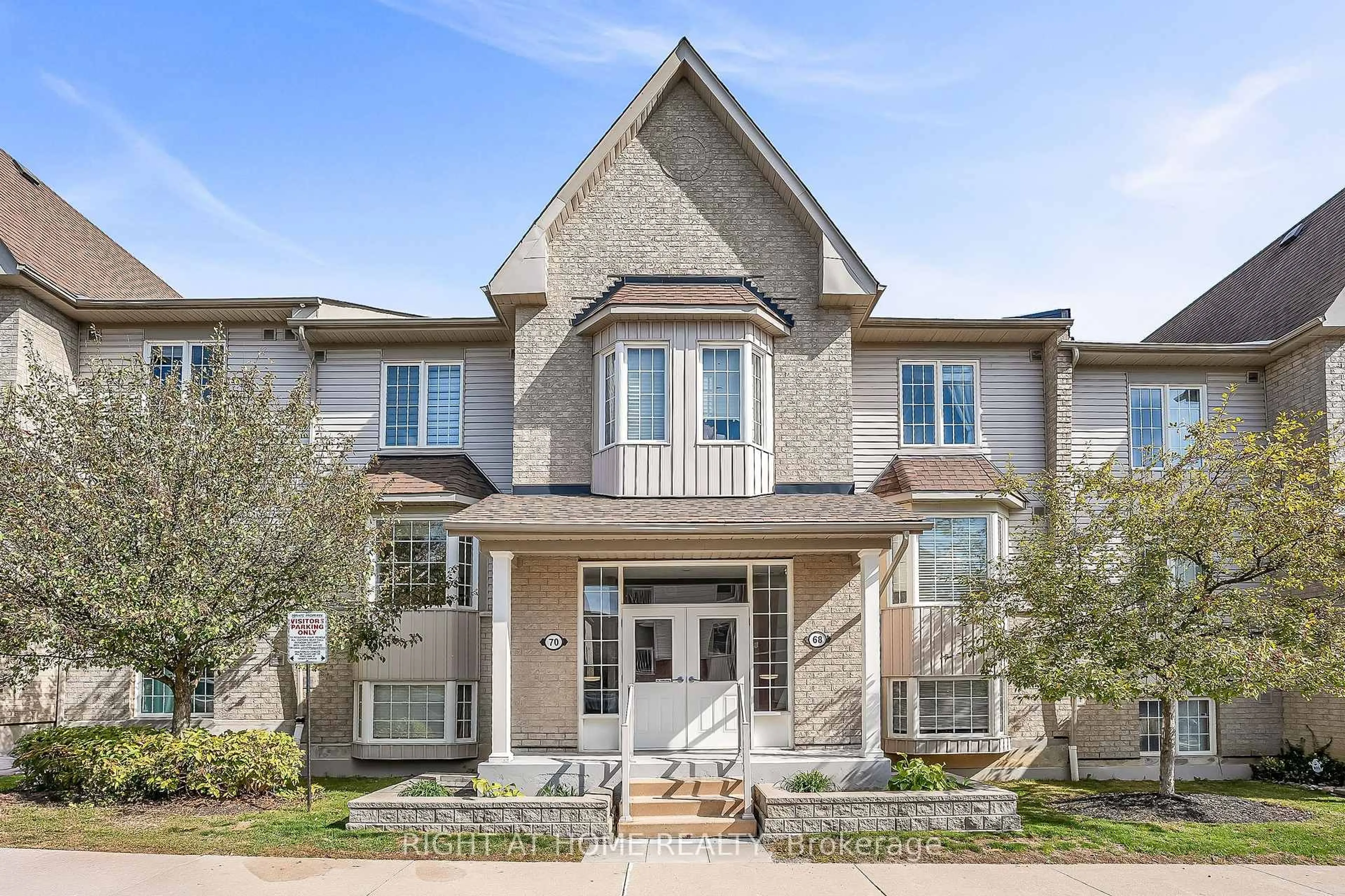 Home with brick exterior material, street for 70 Petra Way #2, Whitby Ontario L1R 0A4