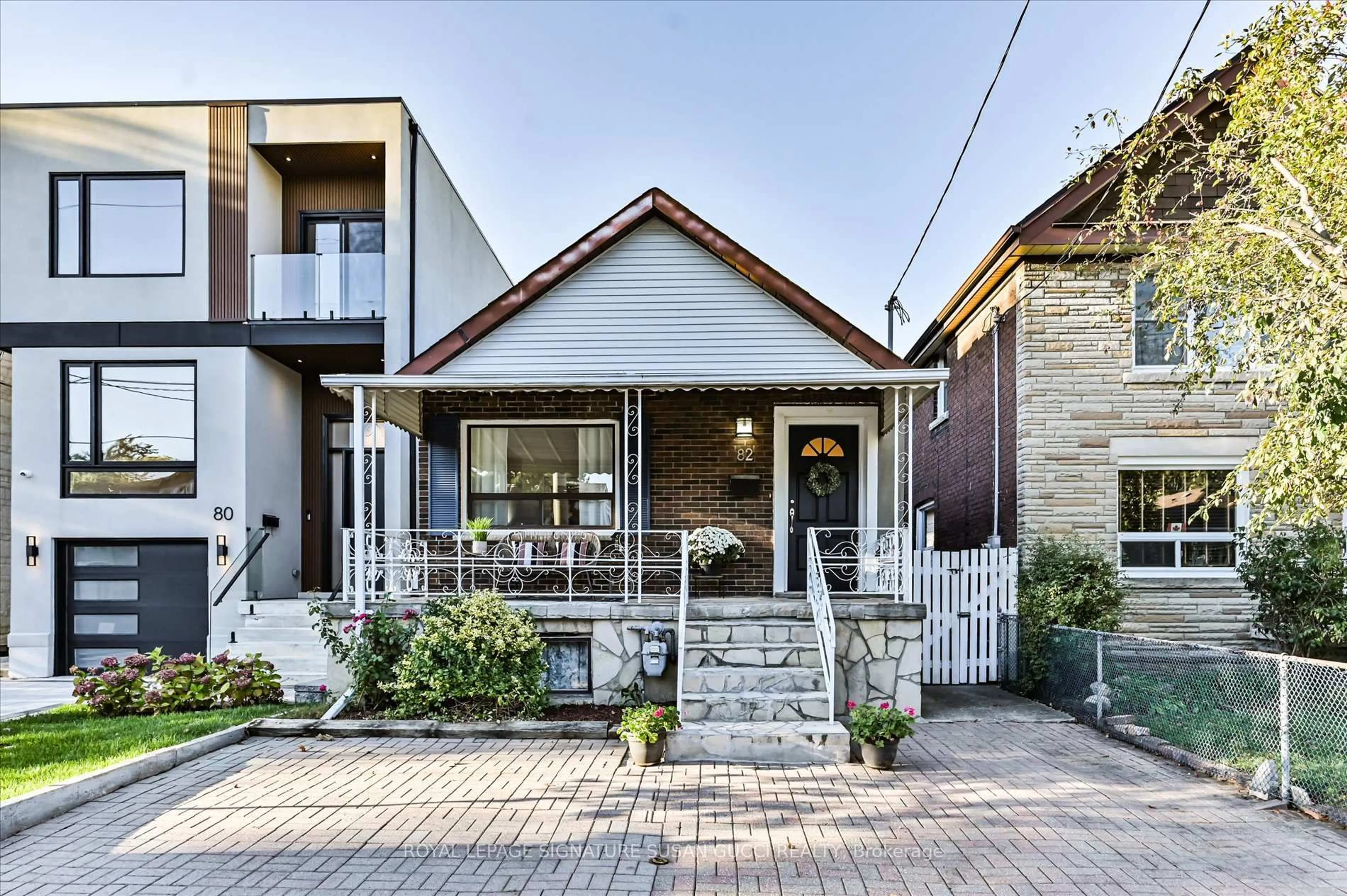 Home with brick exterior material, street for 82 Barker Ave, Toronto Ontario M4C 2N6