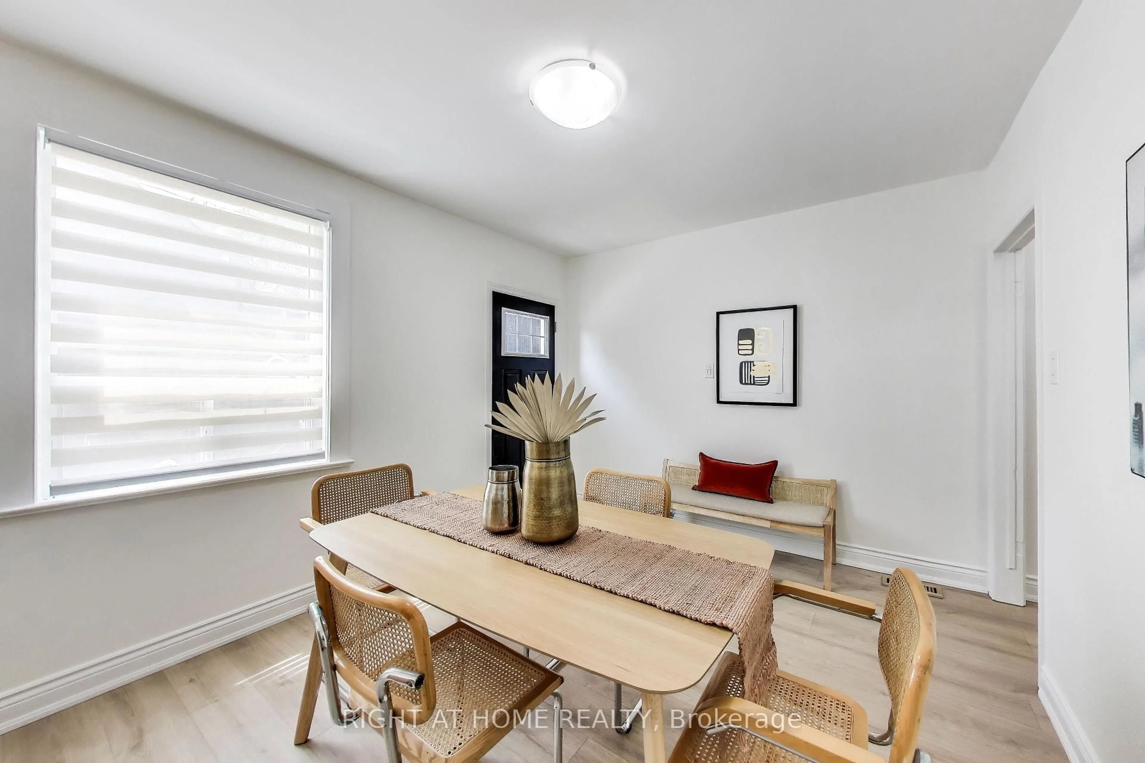 Dining room, wood/laminate floor for 1071 Craven Rd, Toronto Ontario M4J 4V7