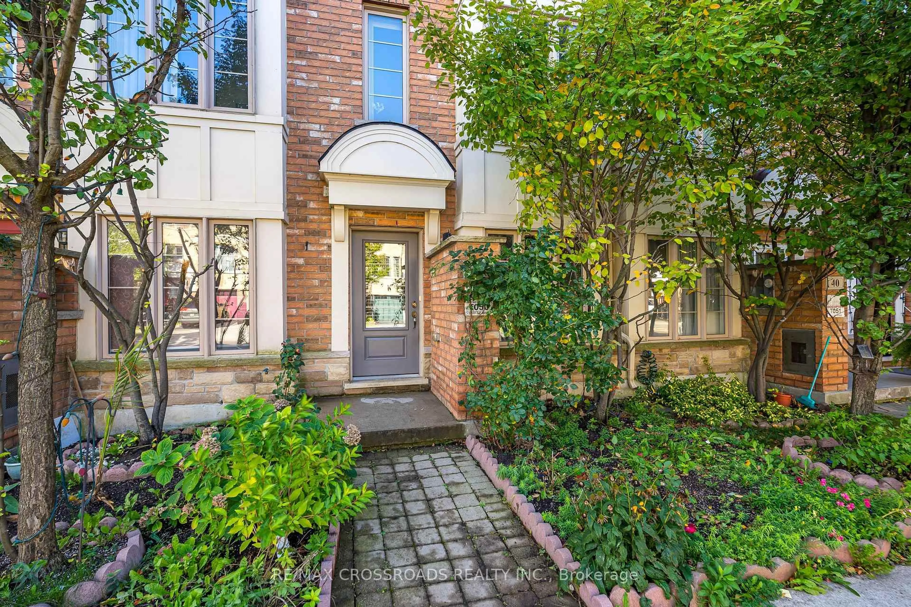 Home with brick exterior material, street for 38 Lily Cup Ave, Toronto Ontario M1L 0H4