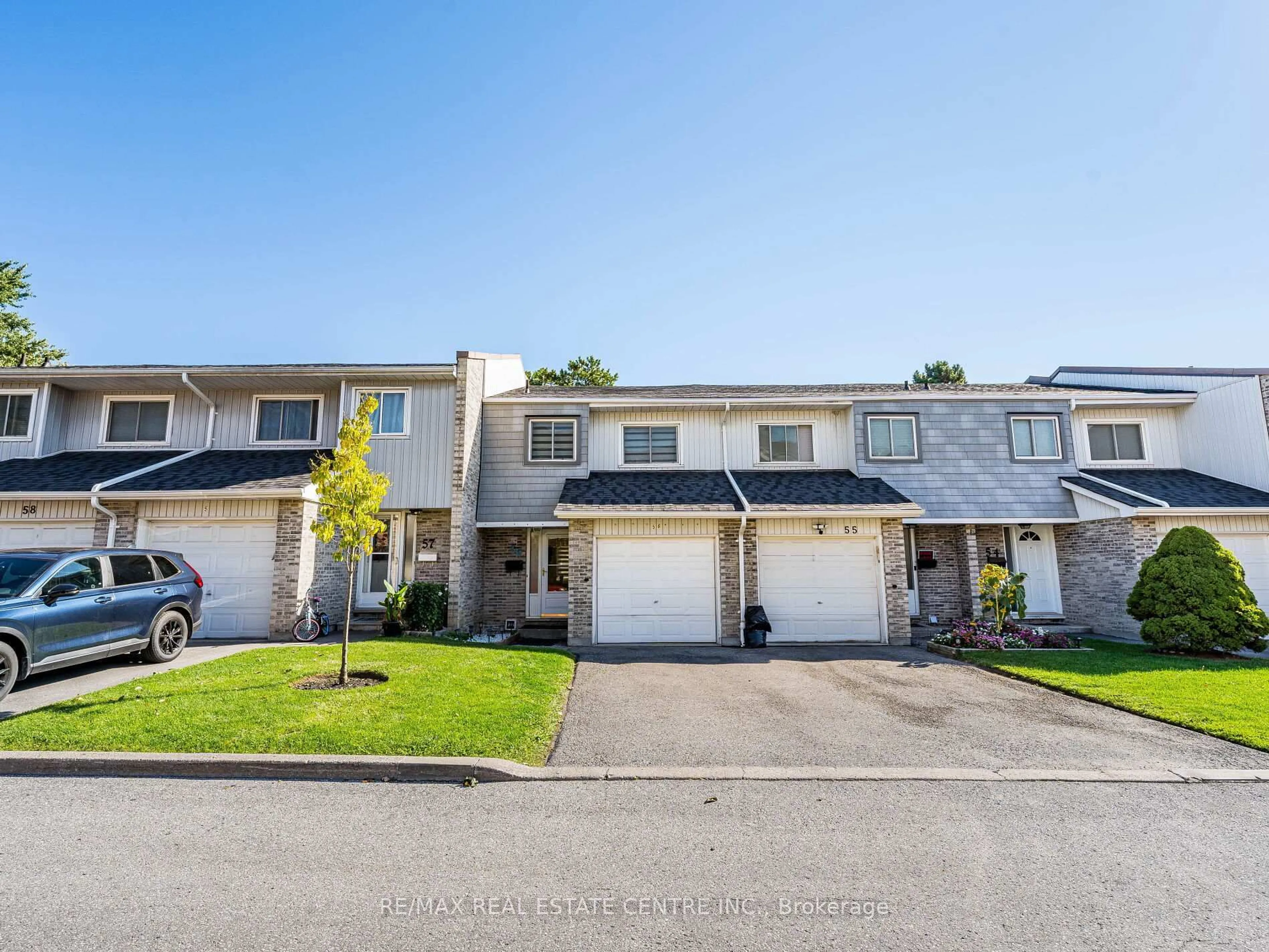 A pic from outside/outdoor area/front of a property/back of a property/a pic from drone, street for 1975 Rosefield Rd #56, Pickering Ontario L1V 3E3