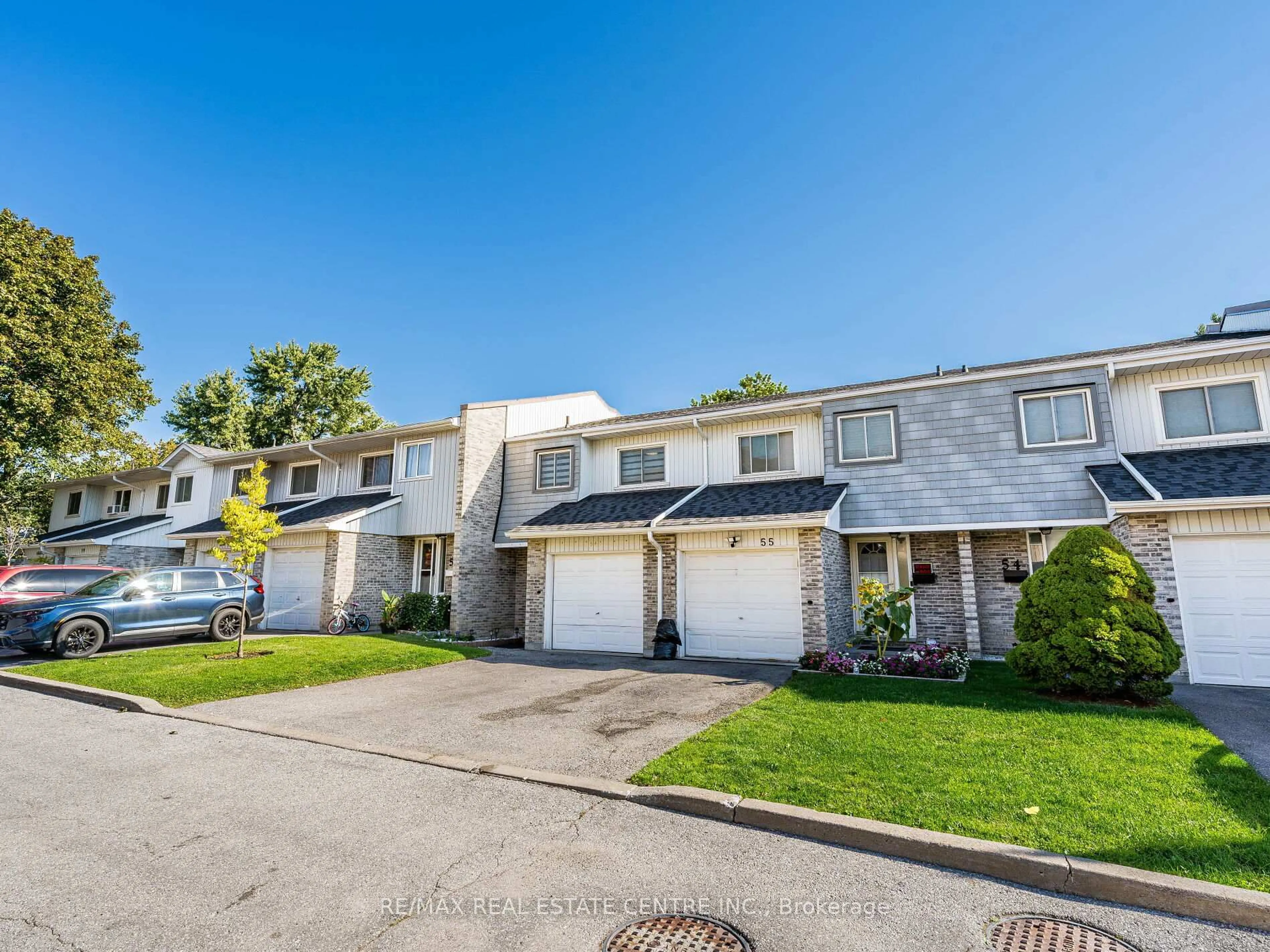 A pic from outside/outdoor area/front of a property/back of a property/a pic from drone, street for 1975 Rosefield Rd #56, Pickering Ontario L1V 3E3