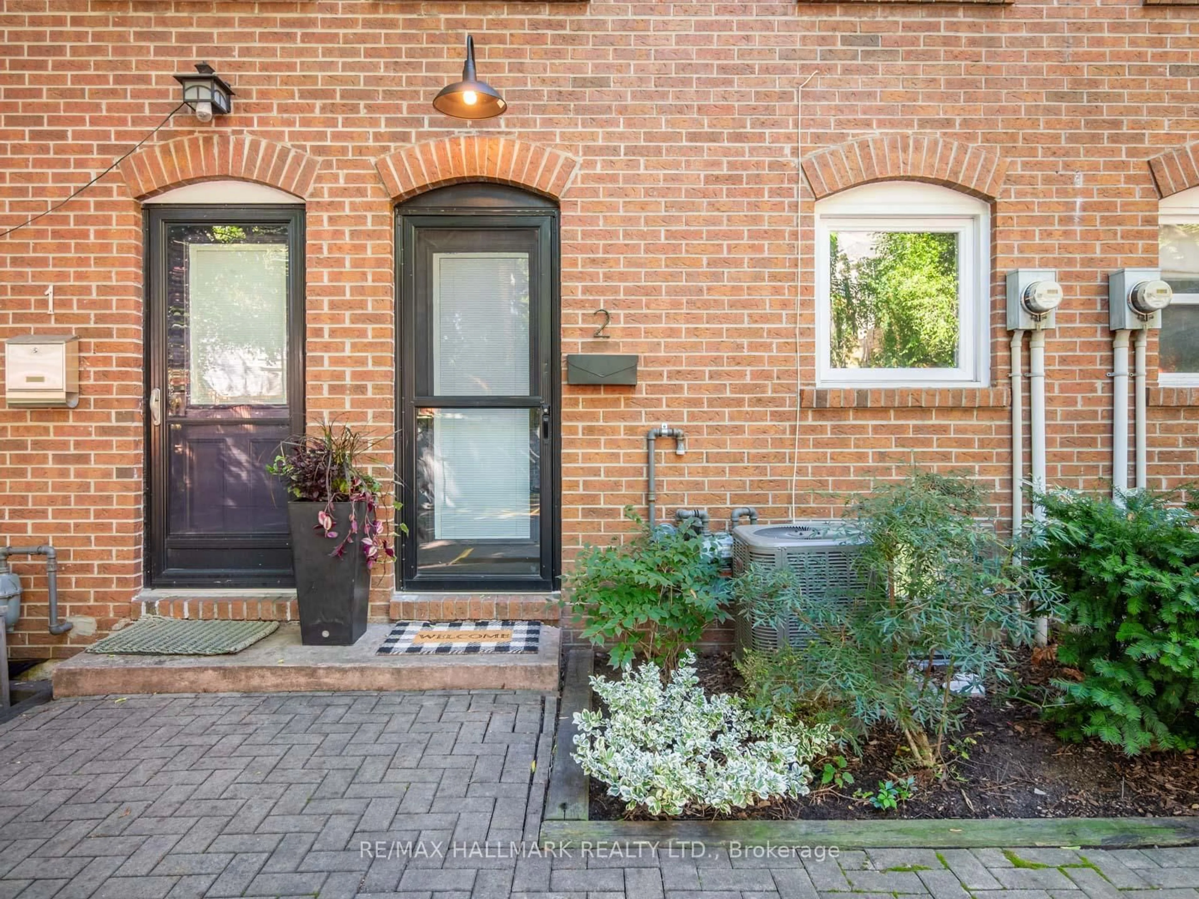 Home with brick exterior material, street for 66 Boultbee Ave #2, Toronto Ontario M4J 1B1