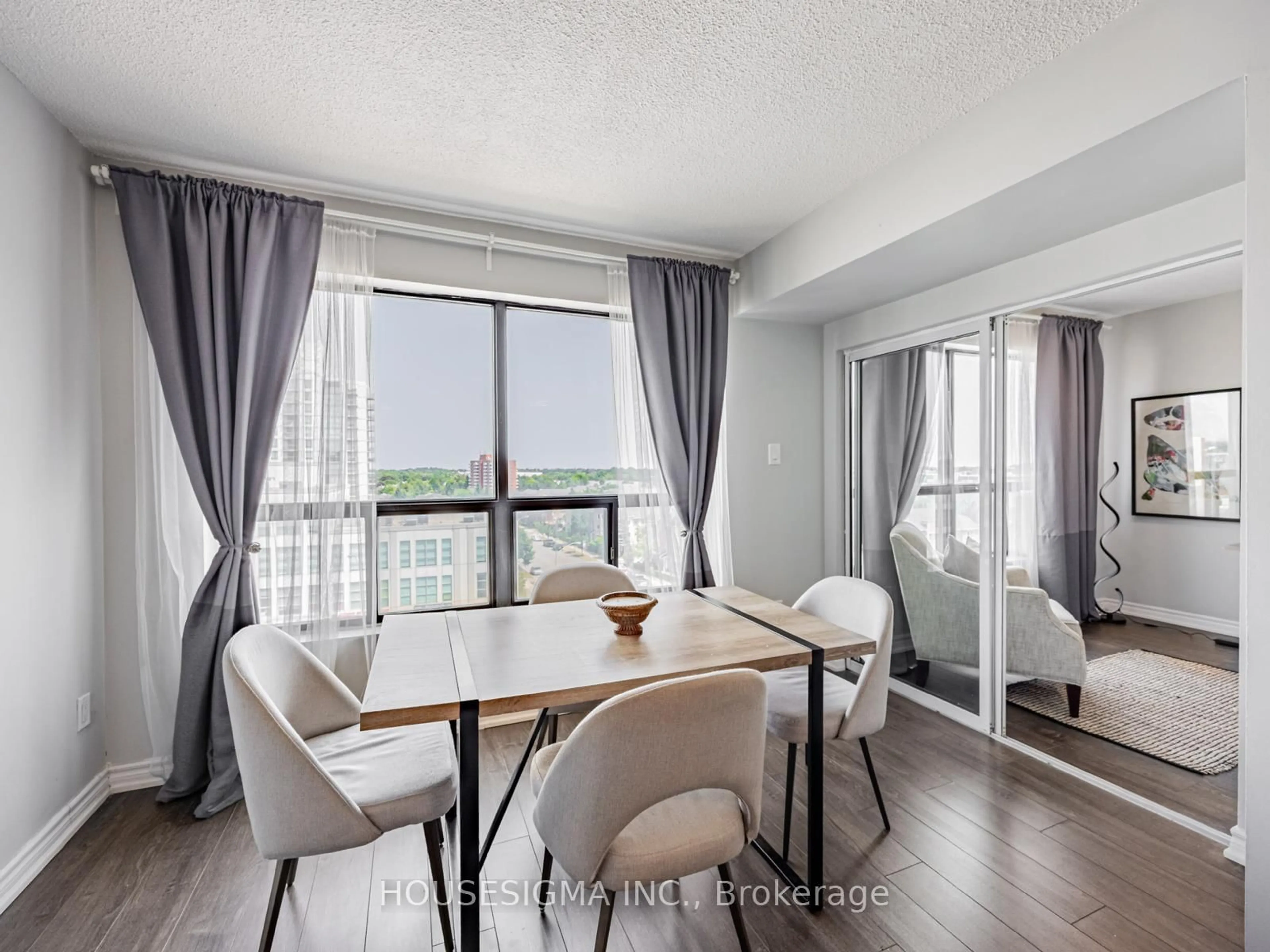 Dining room, wood/laminate floor for 39 Kimbercroft Crt #703, Toronto Ontario M1S 5B5