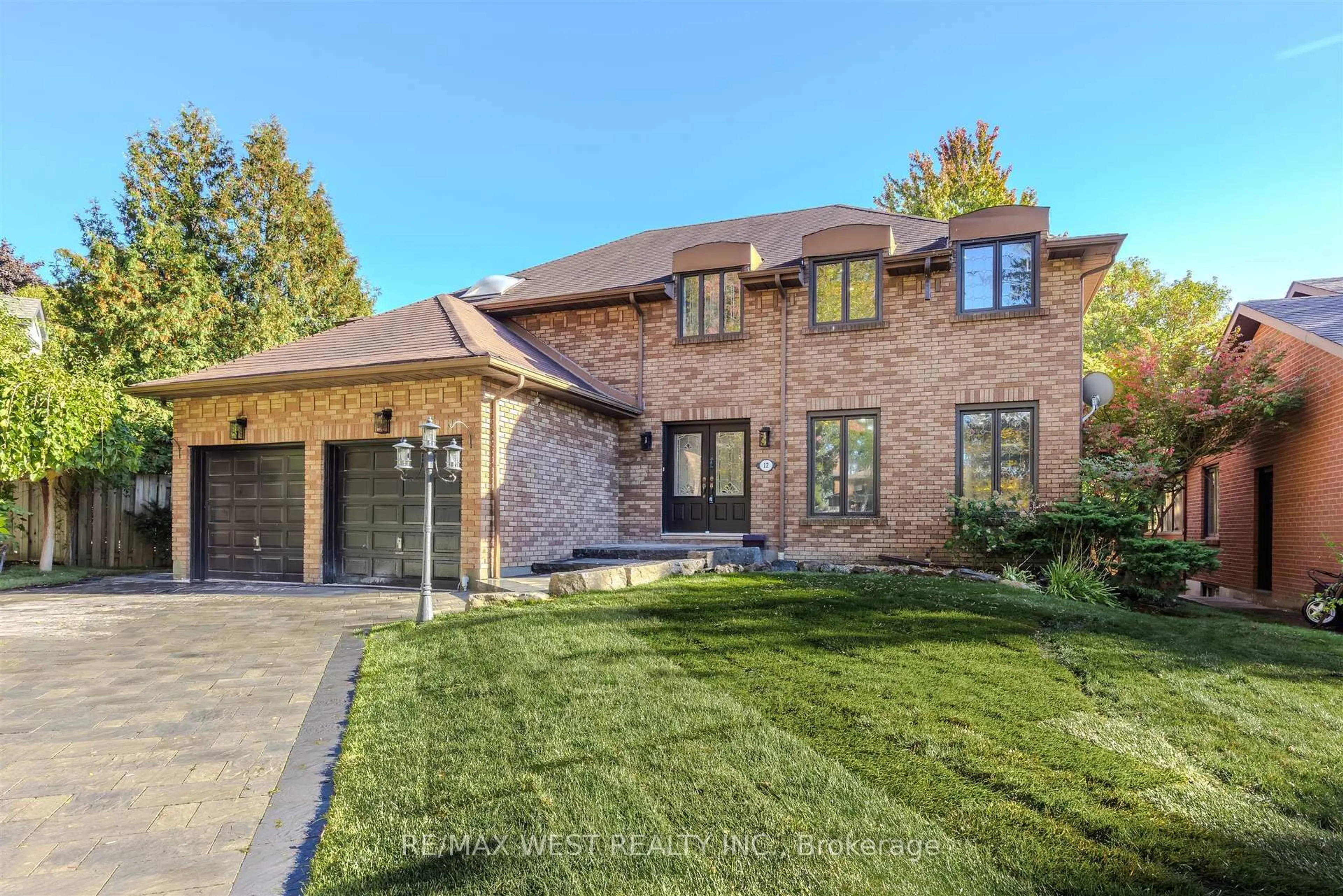 Home with brick exterior material, street for 12 Tredvalley Grve, Toronto Ontario M1C 3J4