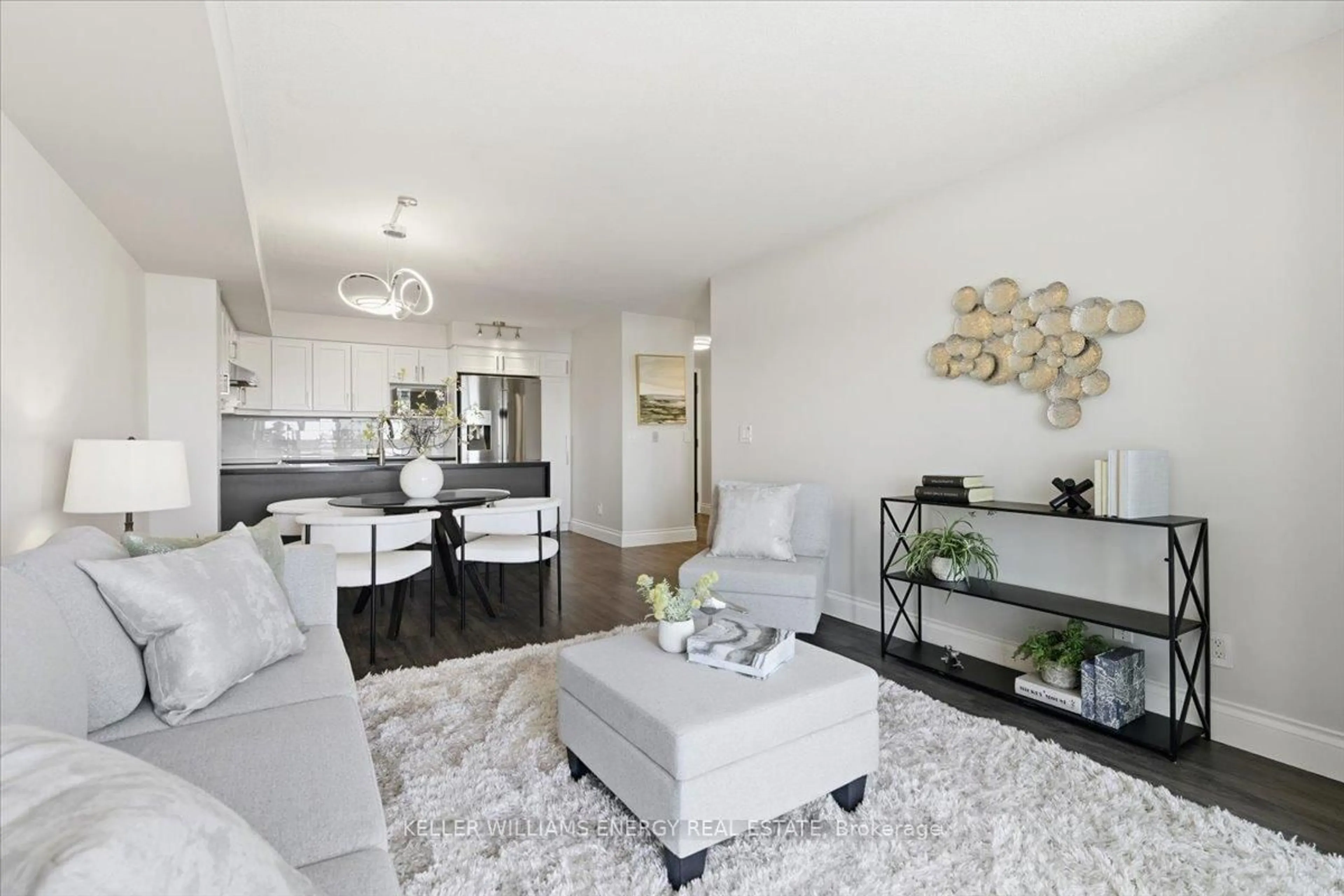 Living room with furniture, unknown for 340 Watson St #907, Whitby Ontario L1N 9G1