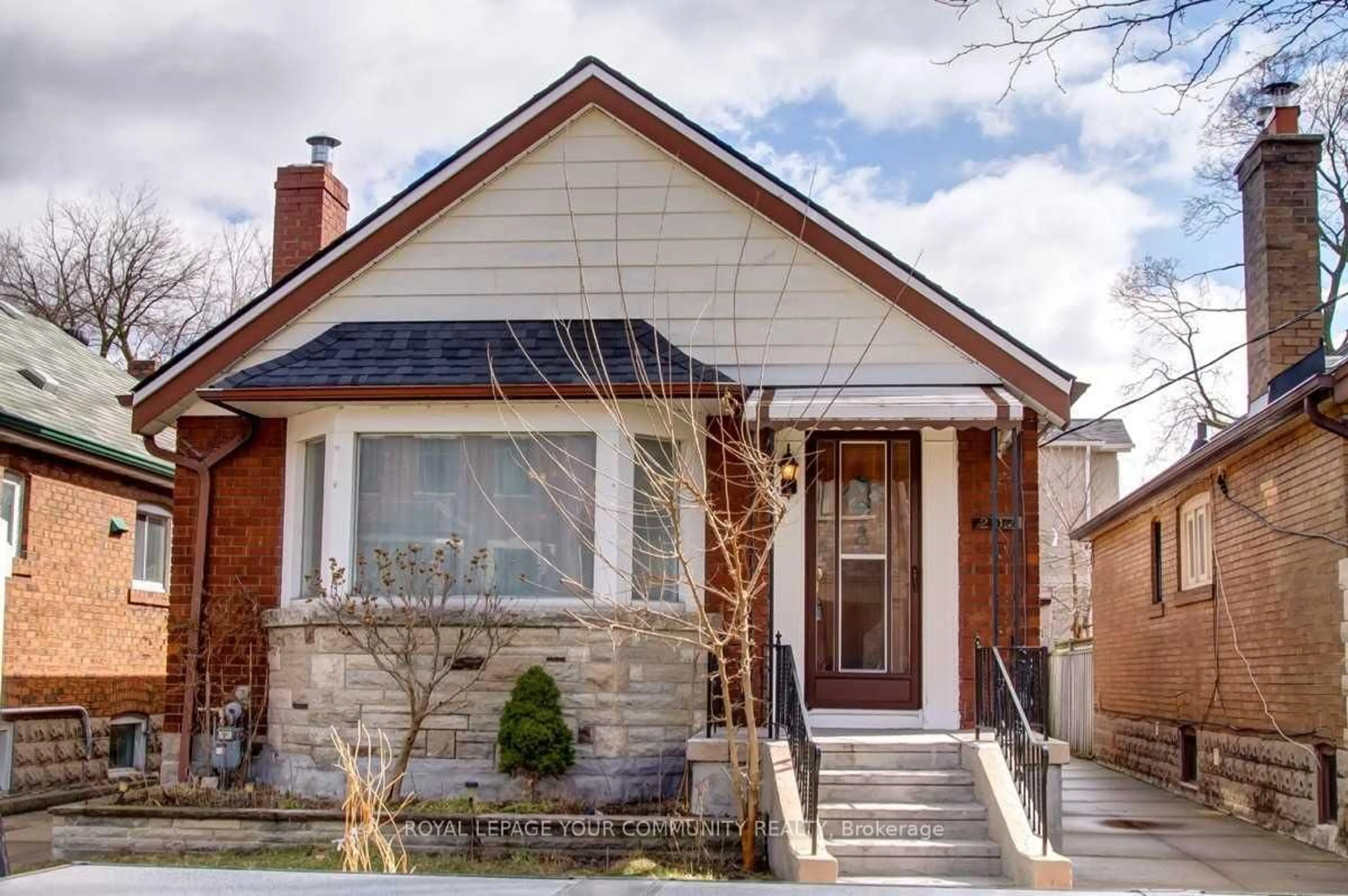 Home with brick exterior material, street for 203 Woodycrest Ave, Toronto Ontario M4J 3C4