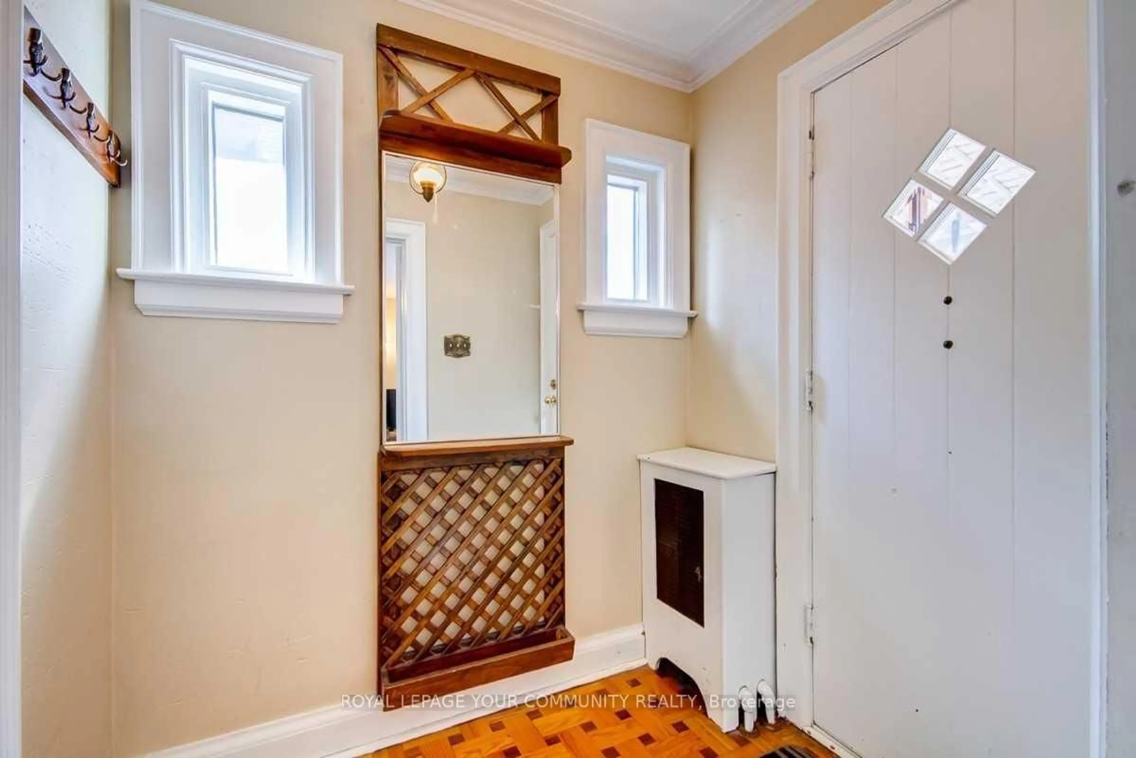 Indoor foyer for 203 Woodycrest Ave, Toronto Ontario M4J 3C4