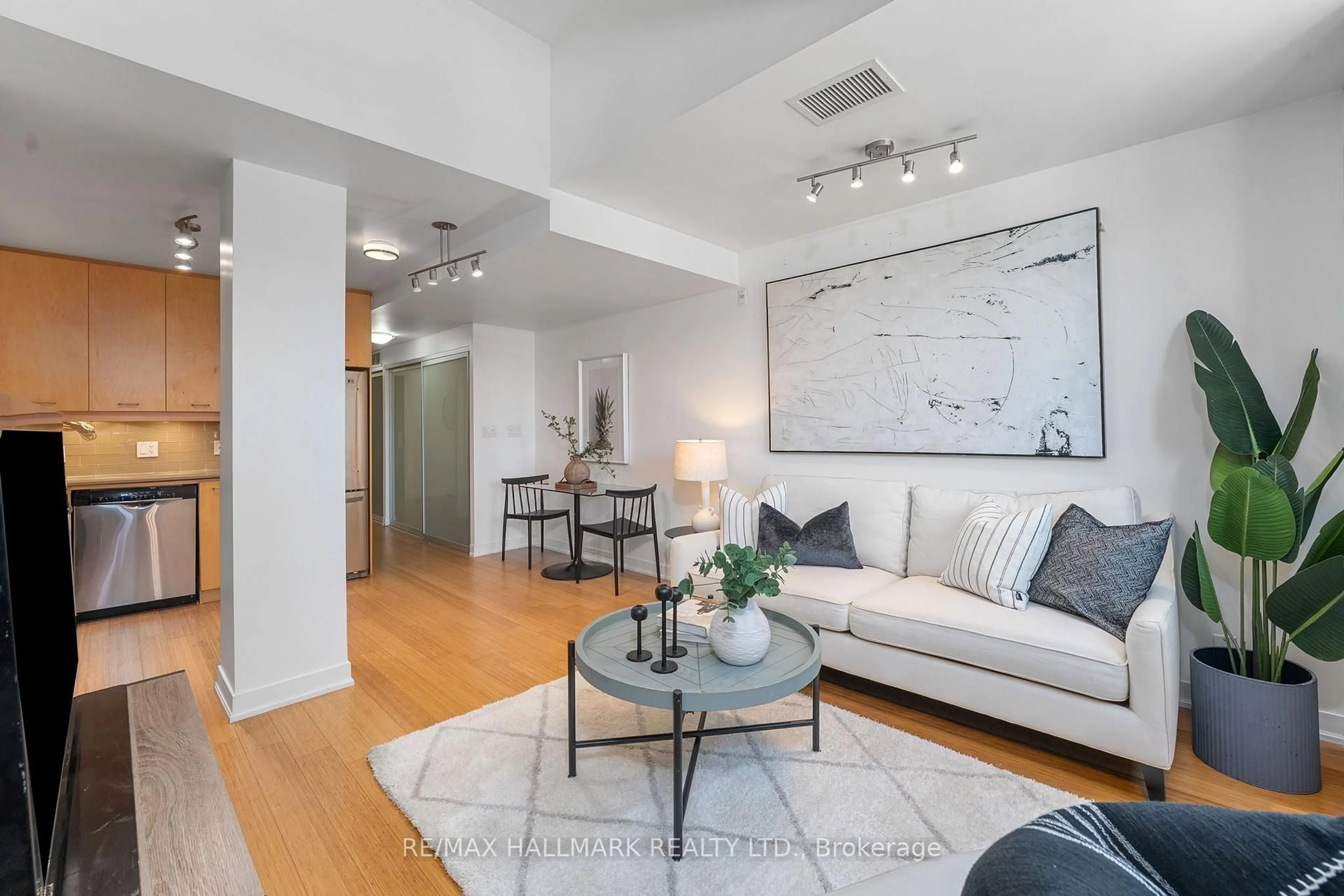 Living room with furniture, unknown for 201 Carlaw Ave #239, Toronto Ontario M4M 2S1