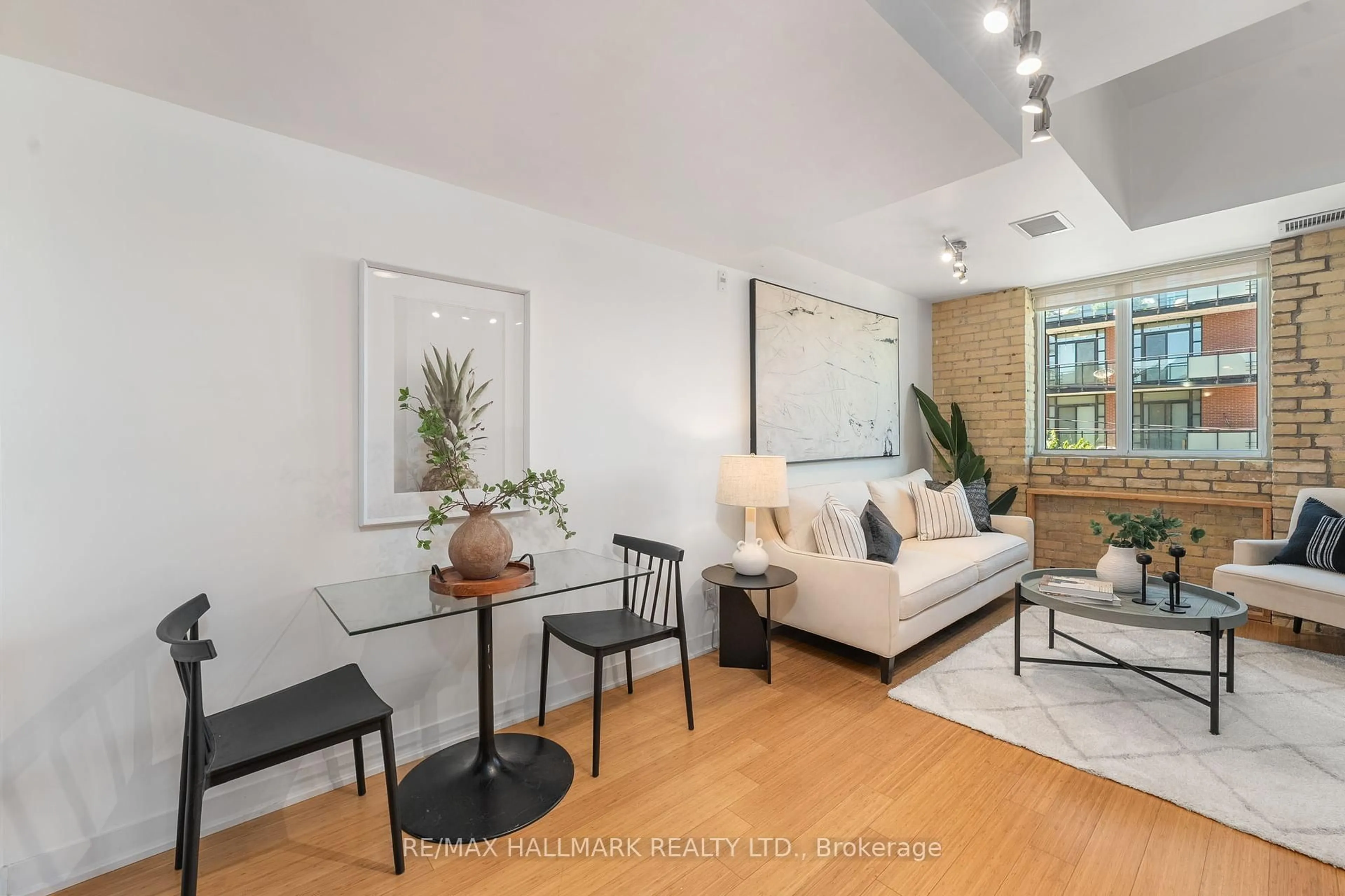 Living room with furniture, unknown for 201 Carlaw Ave #239, Toronto Ontario M4M 2S1