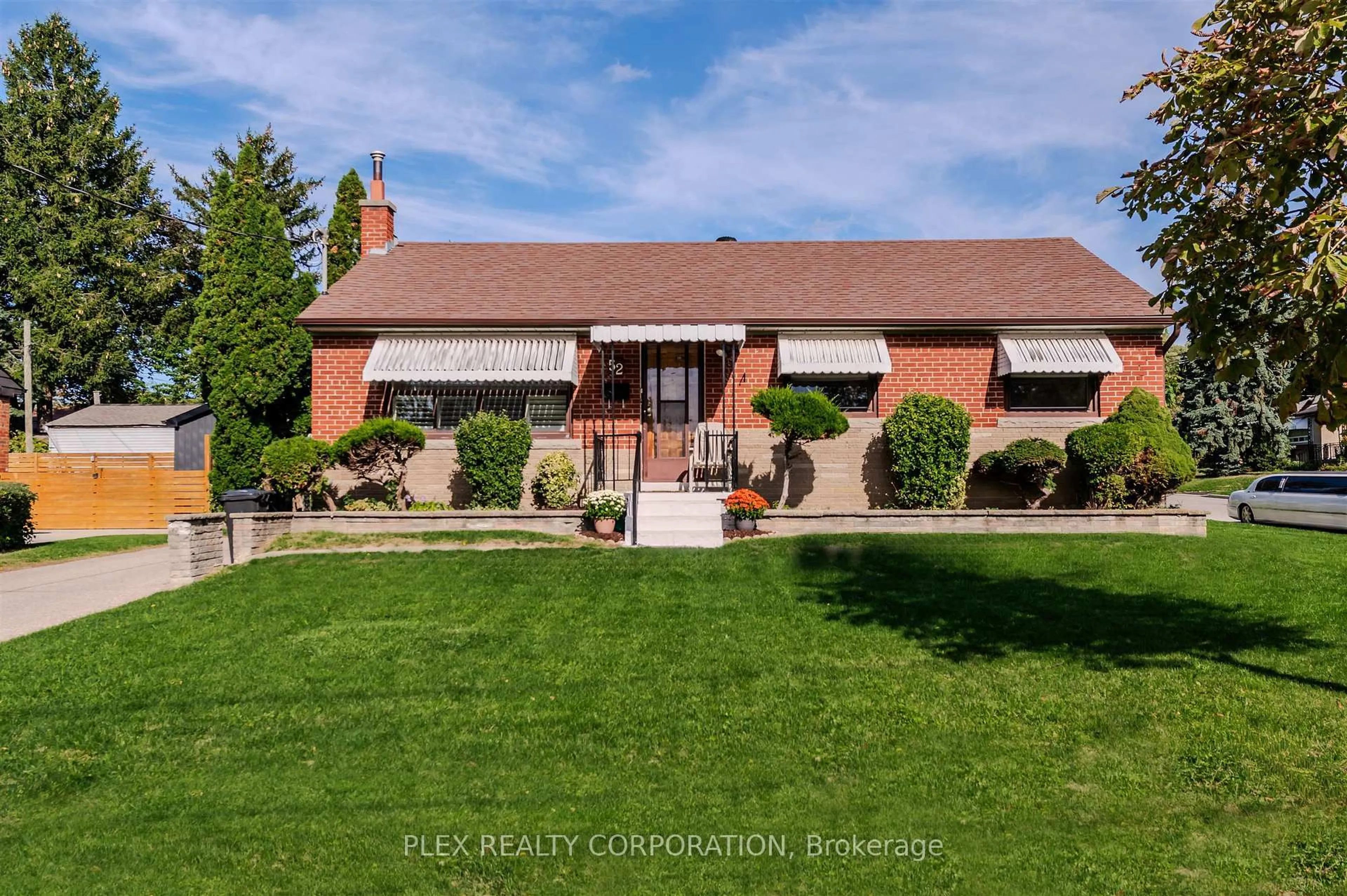 Home with brick exterior material, street for 52 Merrian Rd, Toronto Ontario M1K 3M7