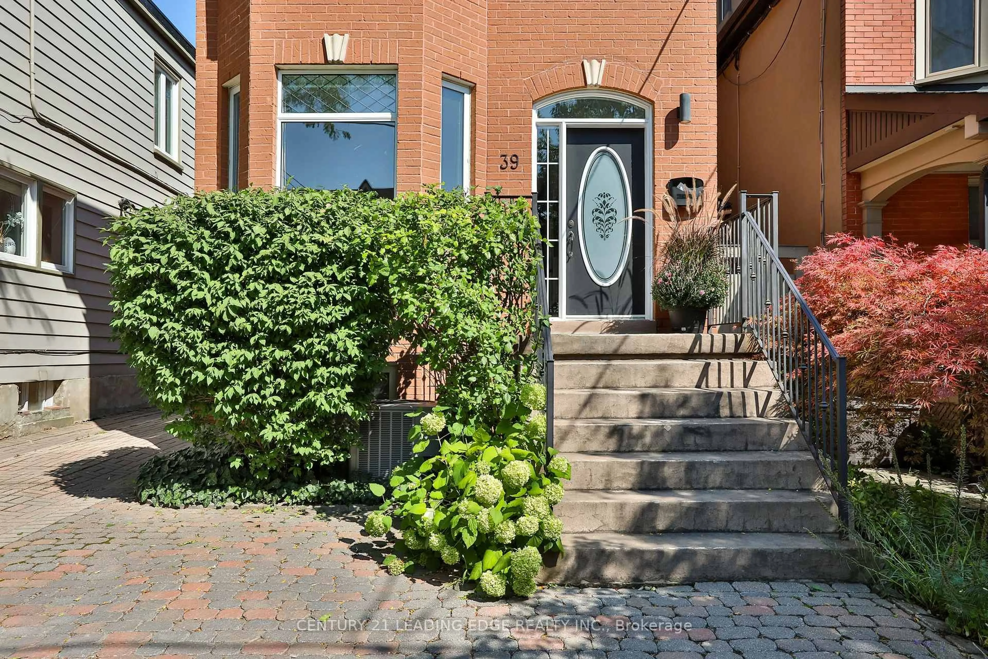 Home with brick exterior material, street for 39 Ferrier Ave, Toronto Ontario M4K 3H5