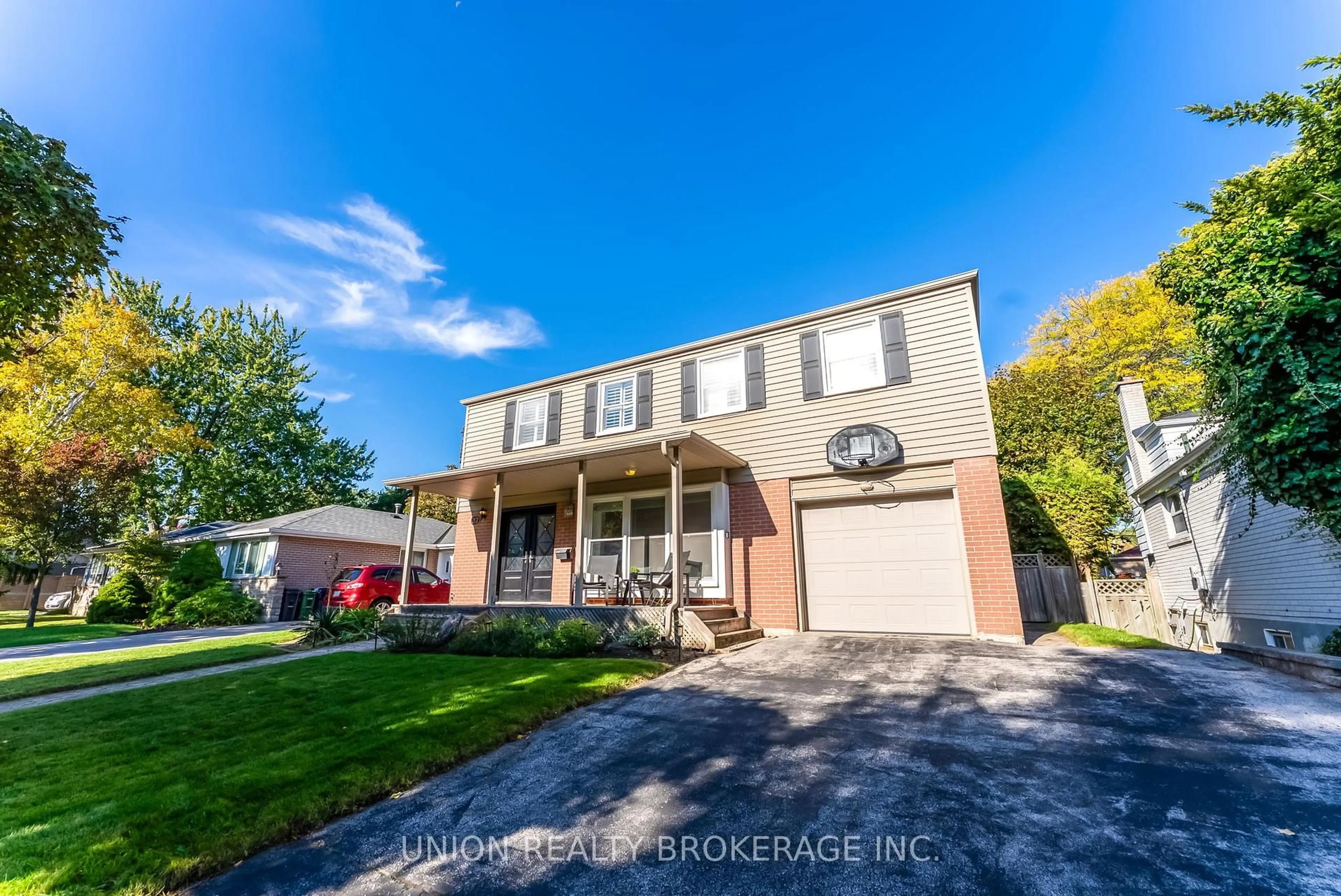 Home with vinyl exterior material, street for 32 Bledlow Manor Dr, Toronto Ontario M1E 1B2