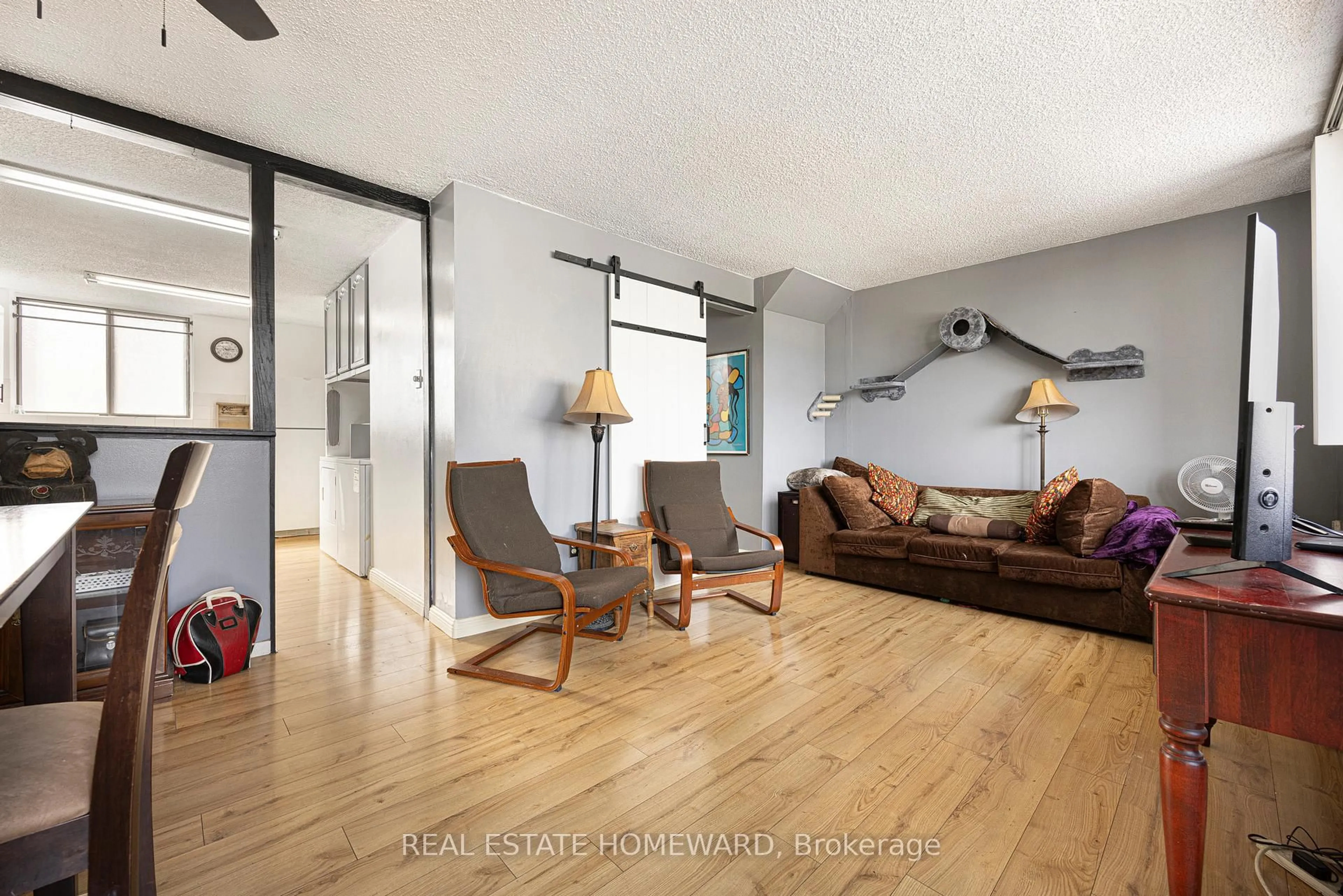 Living room with furniture, unknown for 665 Kennedy Rd #511, Toronto Ontario M1K 5E2