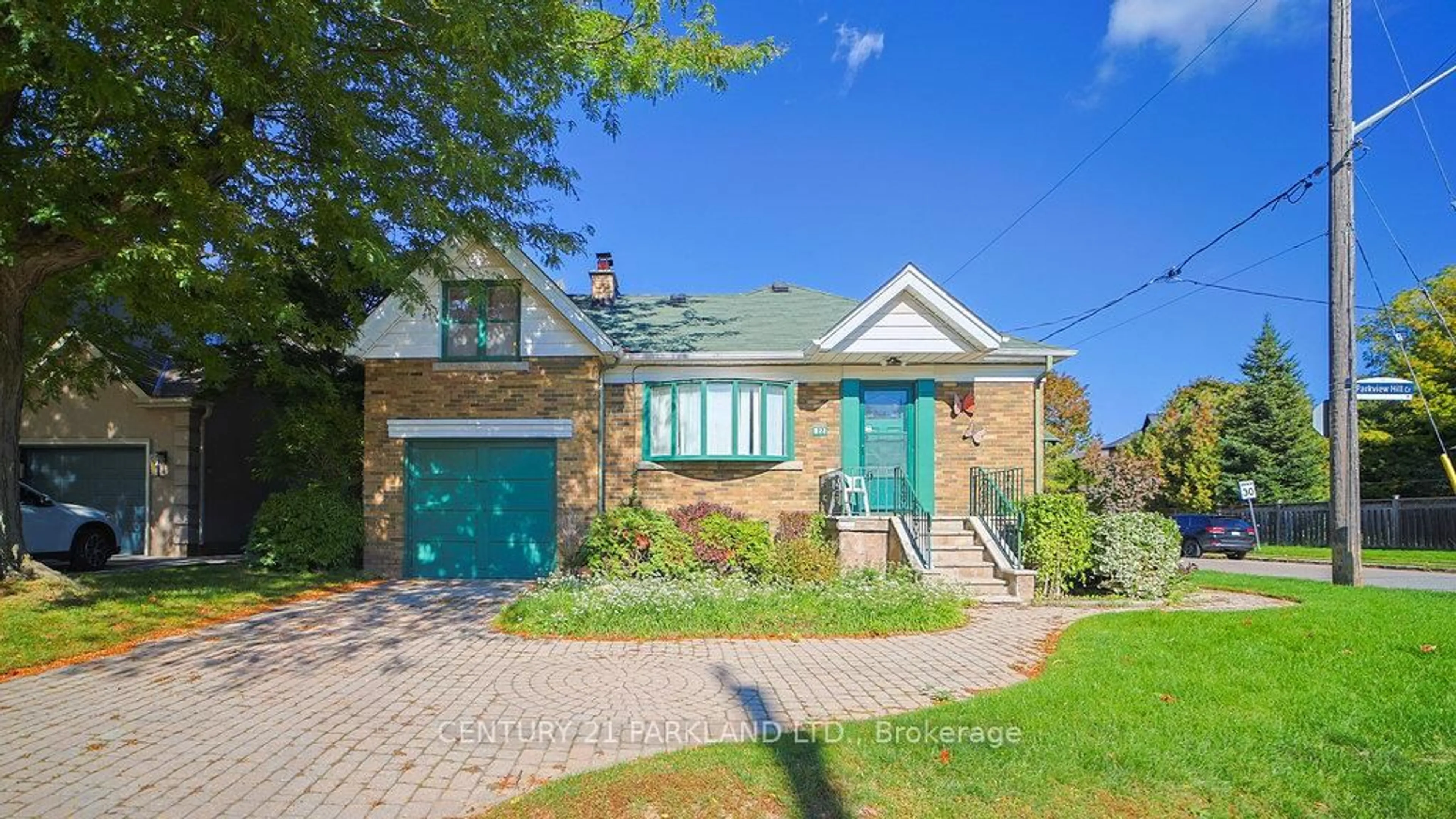 Home with brick exterior material, street for 22 Parkview Hill Cres, Toronto Ontario M4B 1P7