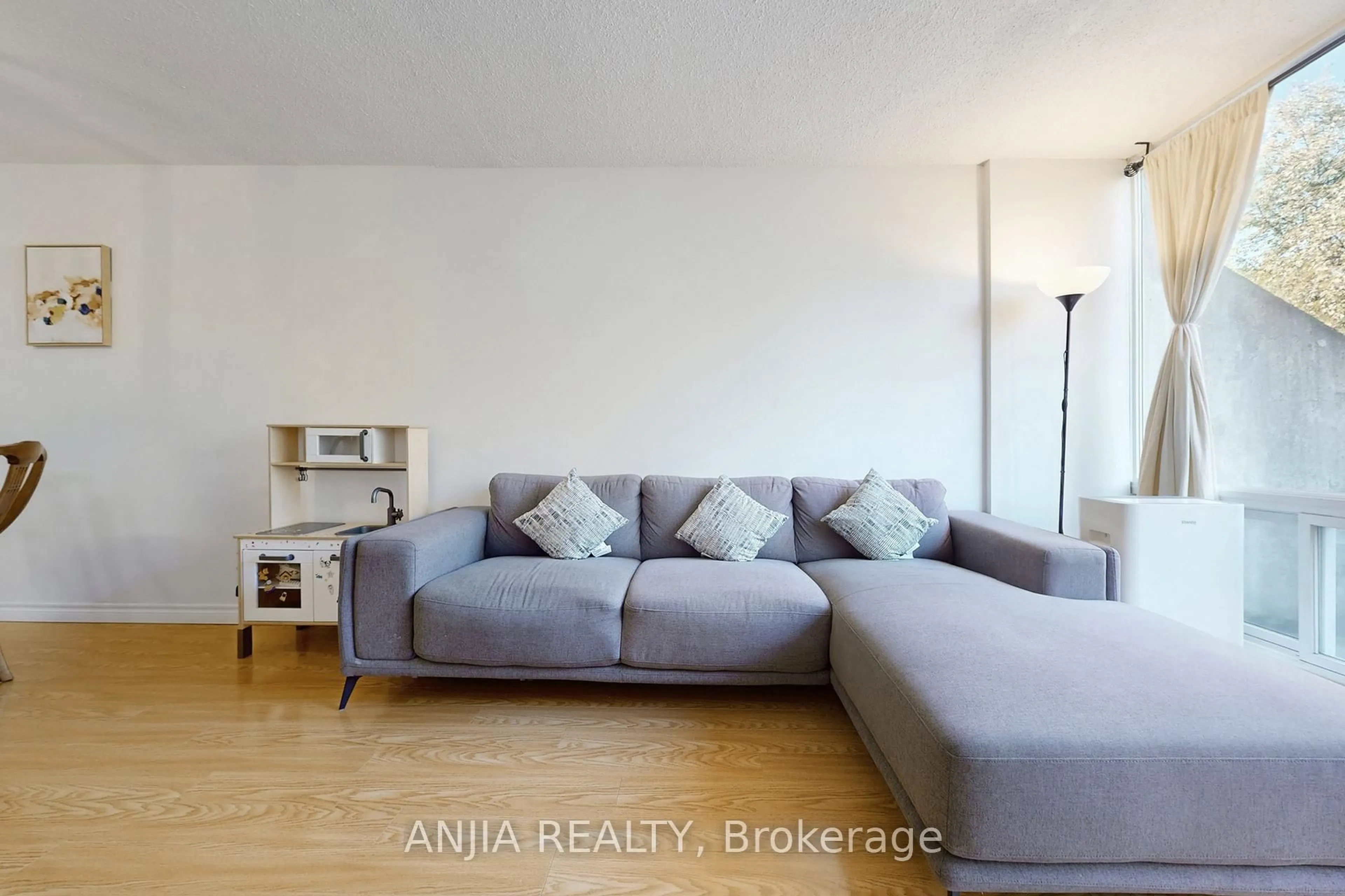 Living room with furniture, unknown for 3765 Sheppard Ave #229, Toronto Ontario M1T 3R7