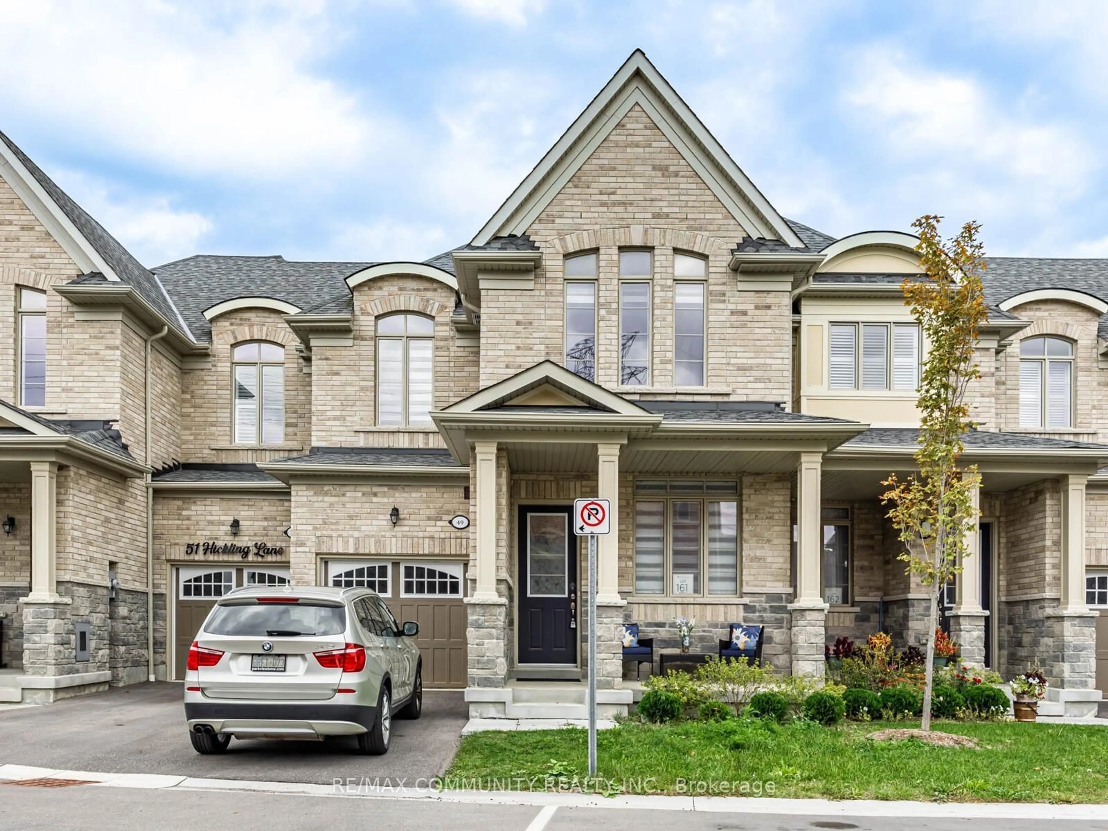 Home with brick exterior material, street for 49 Hickling Lane, Ajax Ontario L1T 0P9