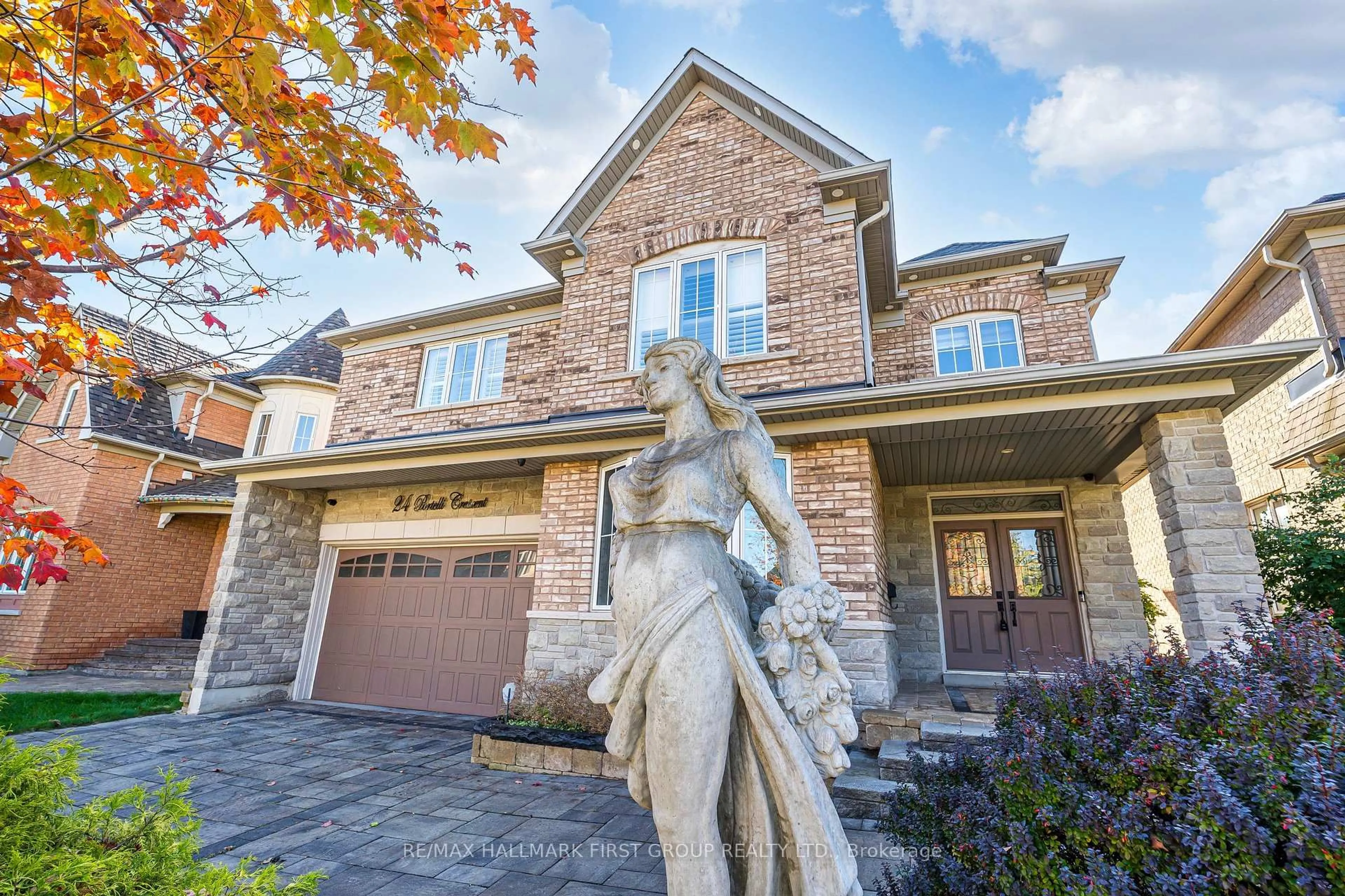 Home with brick exterior material, street for 24 Portelli Cres, Ajax Ontario L1Z 0C3