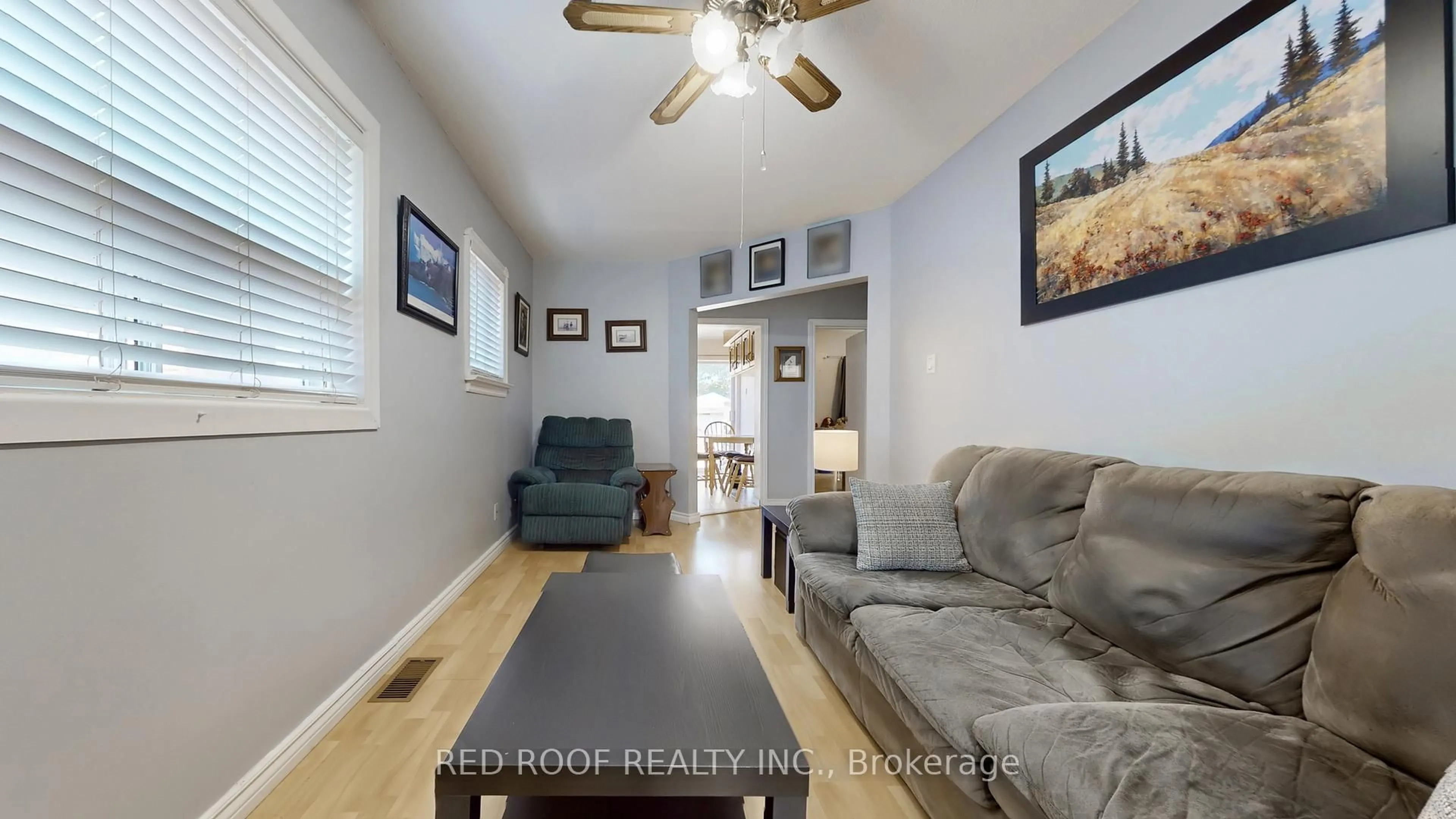 Living room with furniture, wood/laminate floor for 80 Dunkirk Rd, Toronto Ontario M4C 2M6
