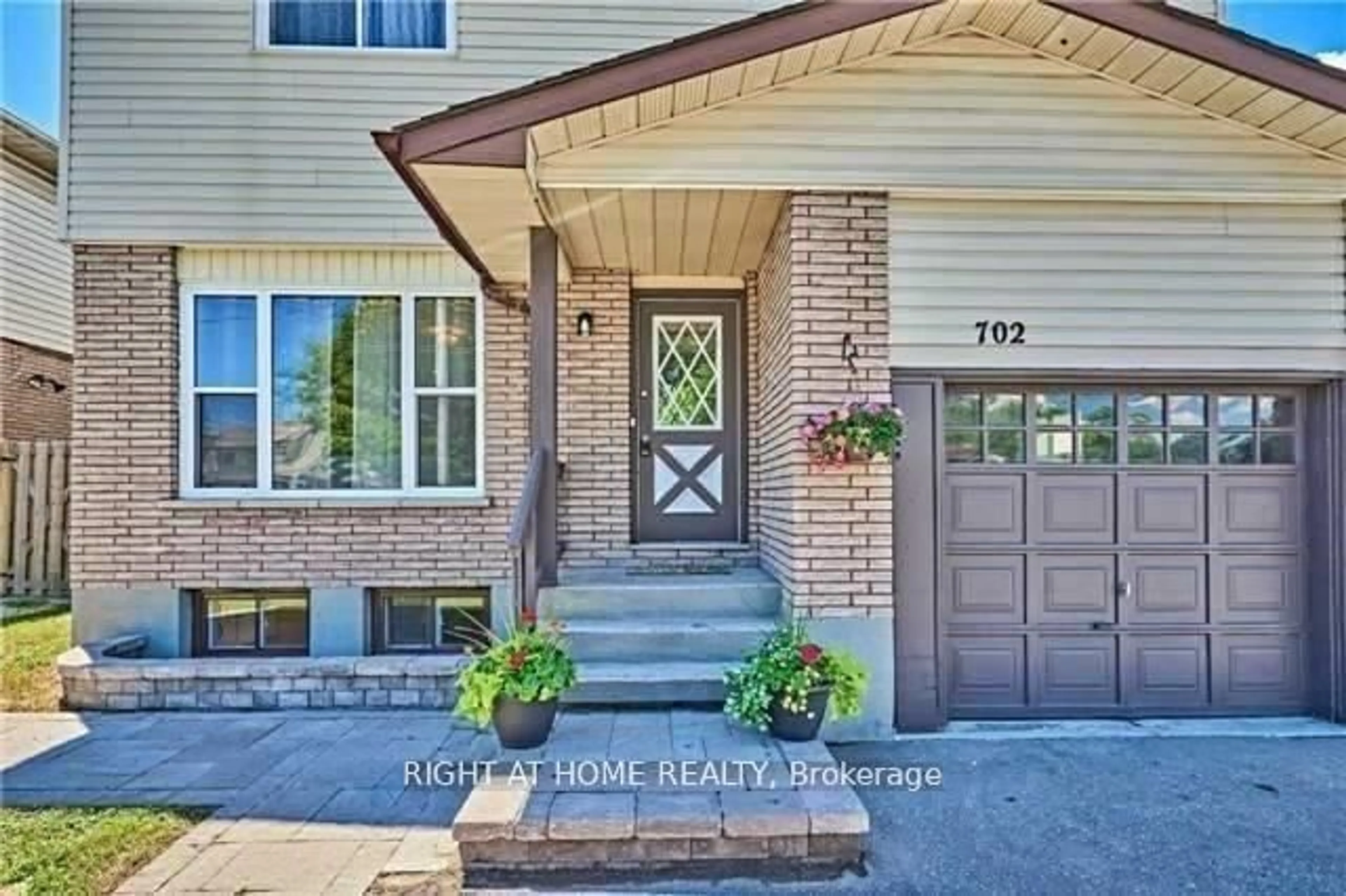 Home with brick exterior material, street for 702 Brock St, Whitby Ontario L1N 4L2