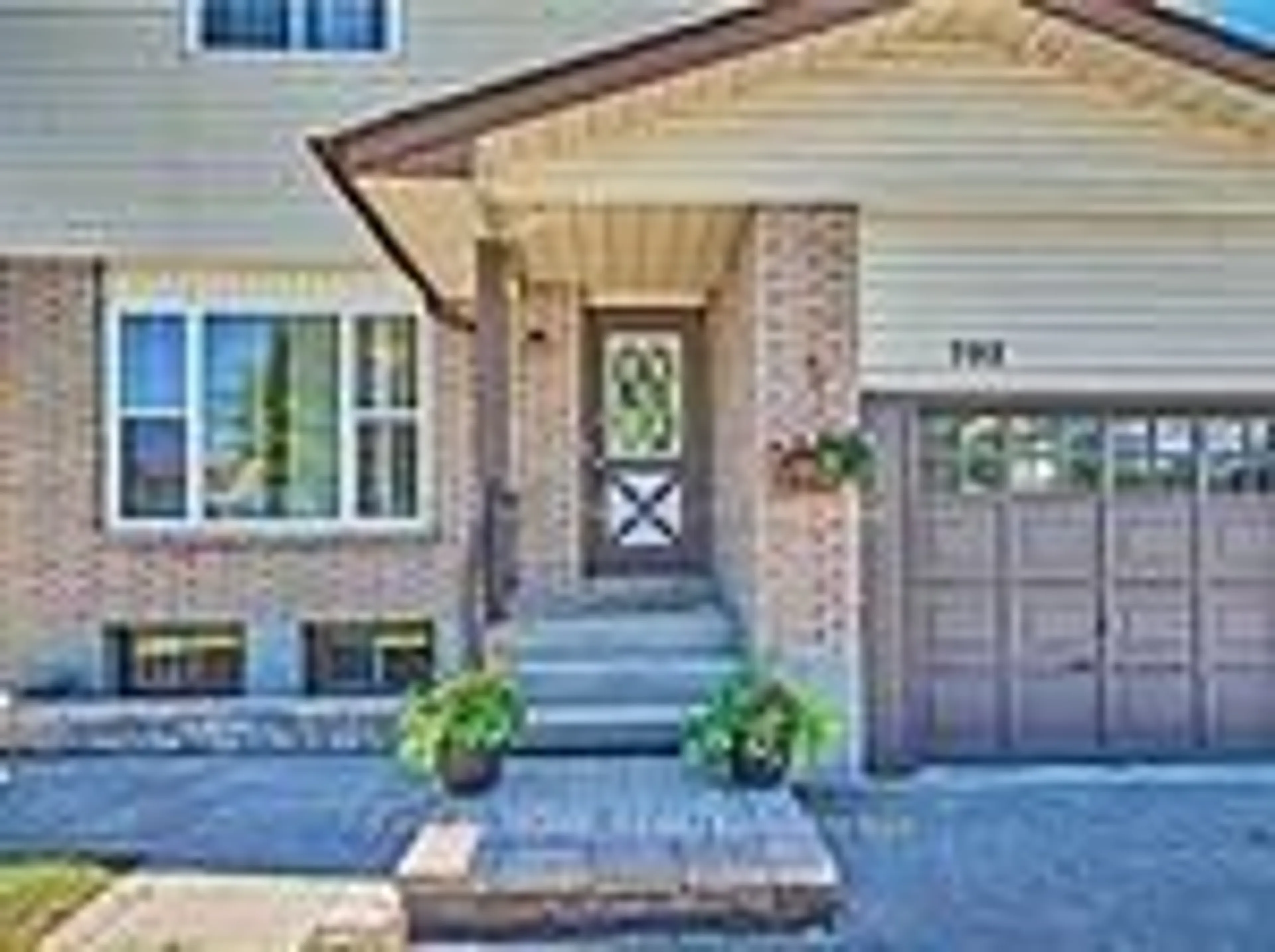 Home with brick exterior material, street for 702 Brock St, Whitby Ontario L1N 4L2
