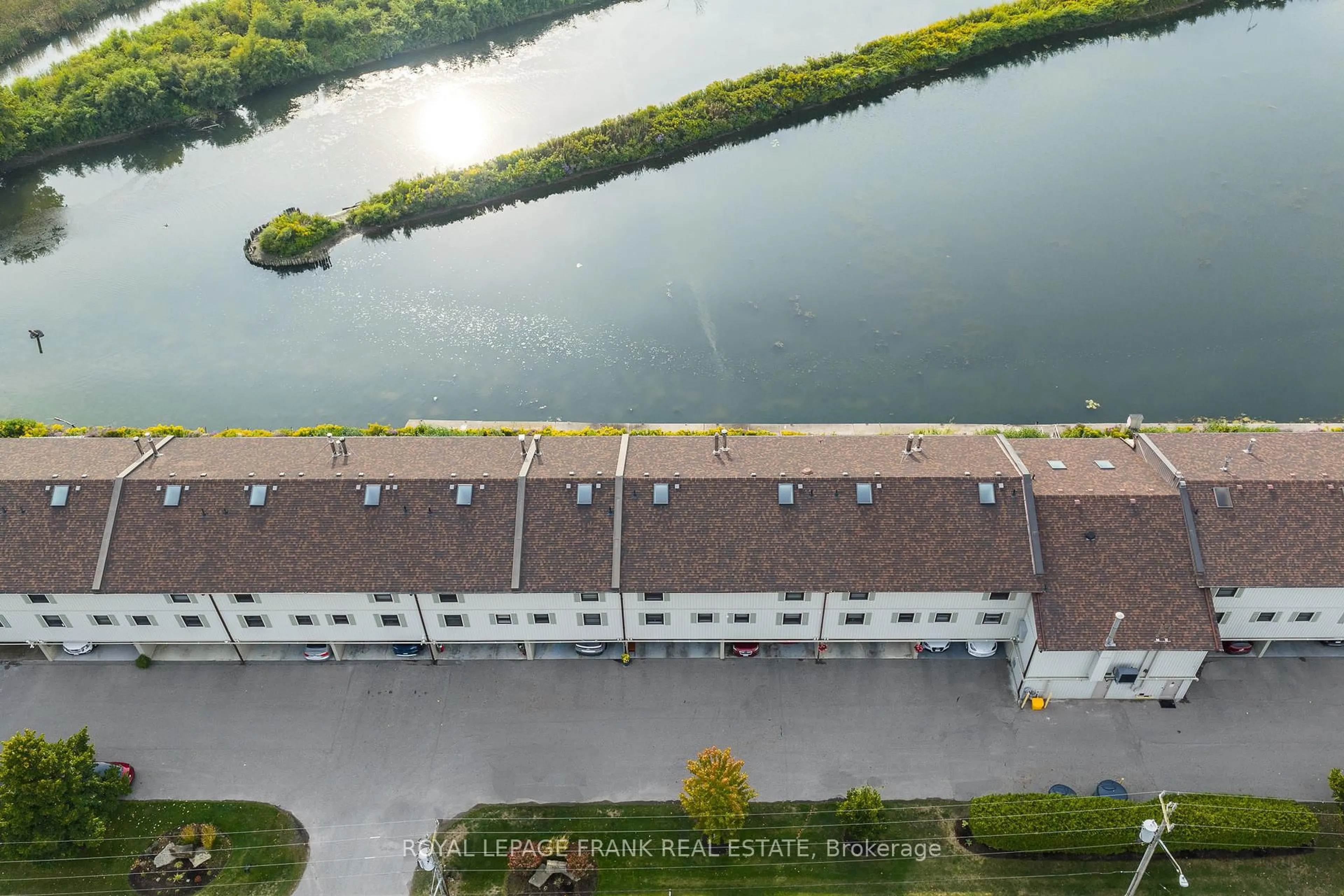 A pic from outside/outdoor area/front of a property/back of a property/a pic from drone, water/lake/river/ocean view for 120 Port Darlington Rd #15, Clarington Ontario L1C 3K3