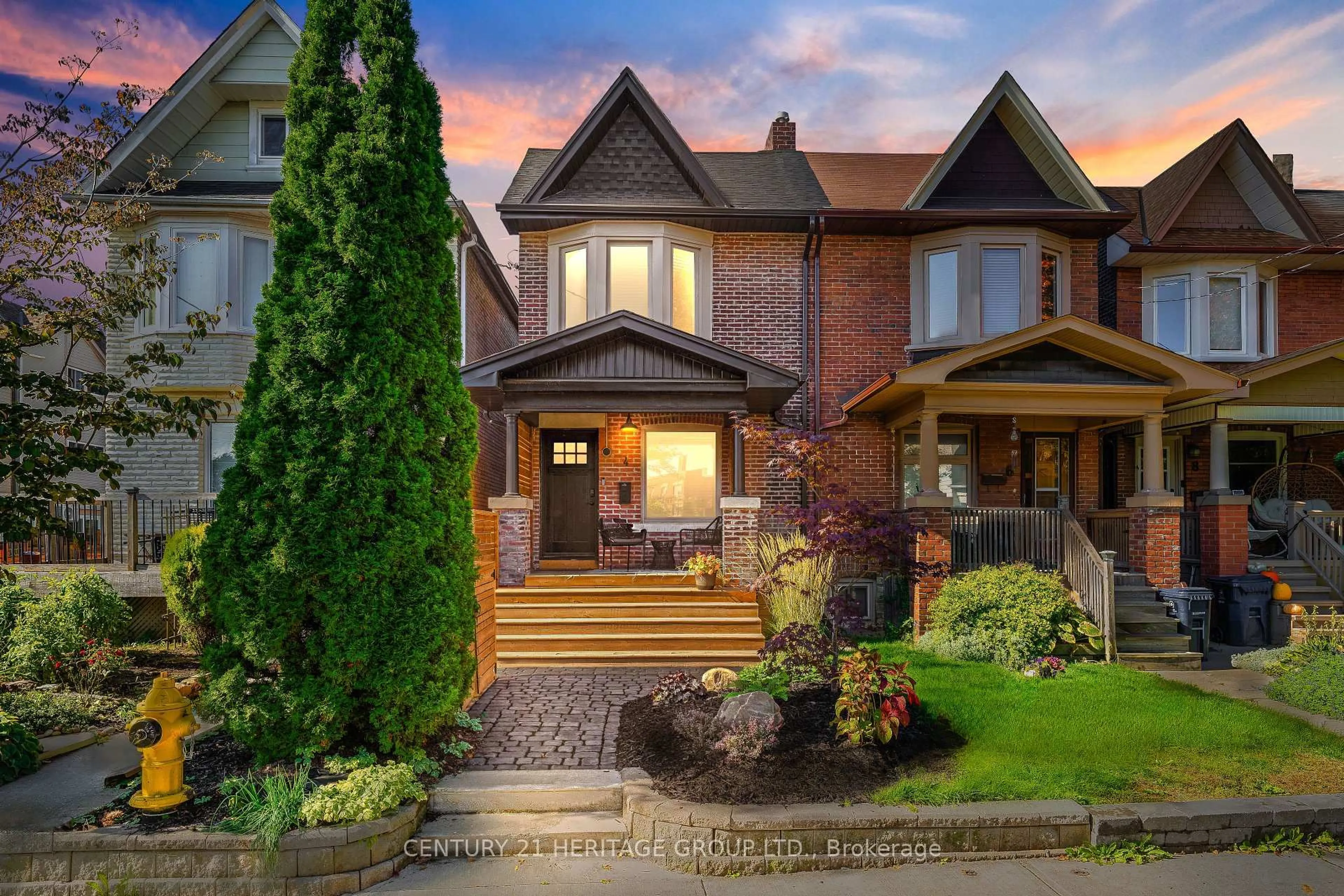 Home with brick exterior material, street for 4 Orchard Park Blvd, Toronto Ontario M4L 3E2