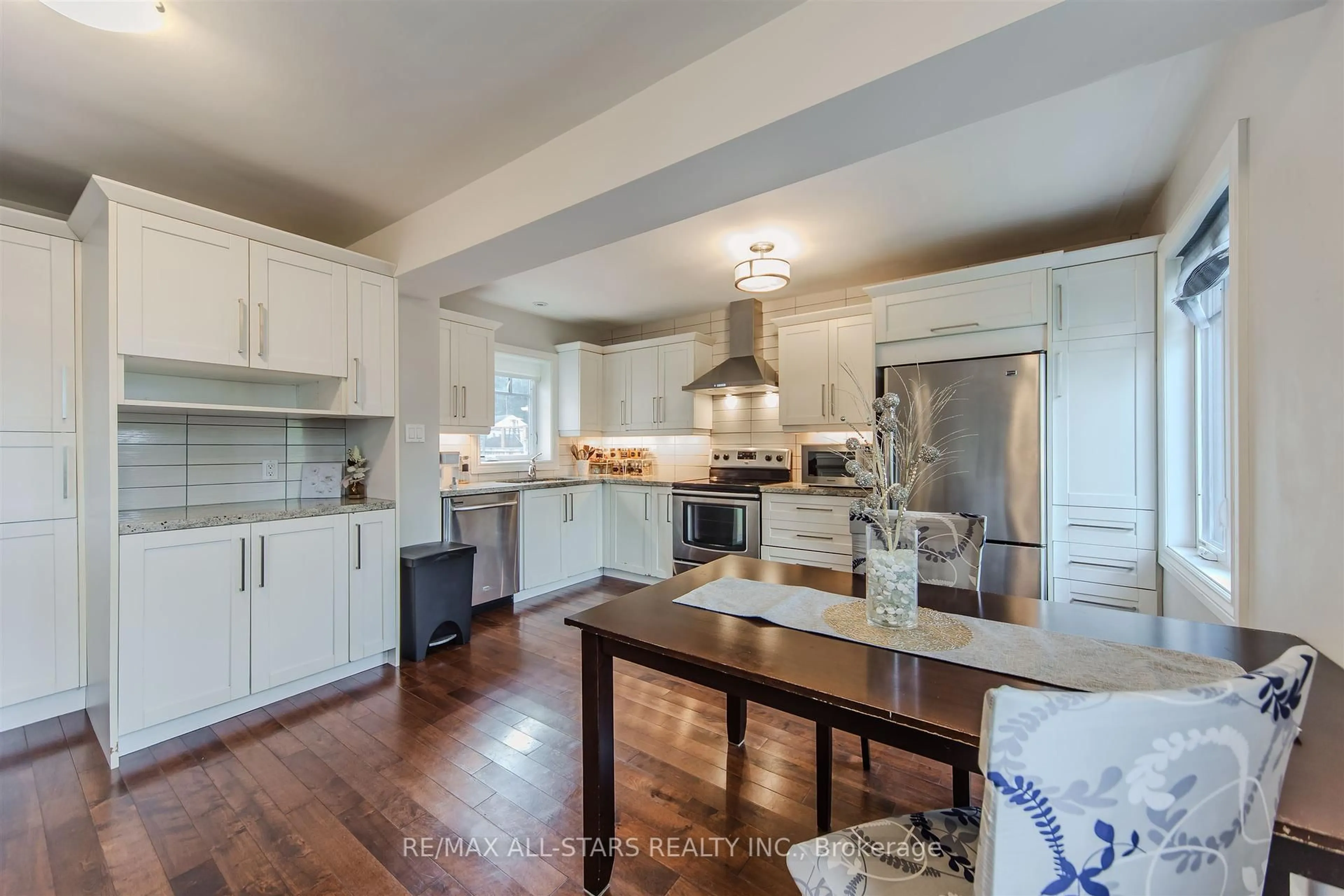 Open concept kitchen, wood/laminate floor for 27 Martindale Rd, Toronto Ontario M1M 2B8