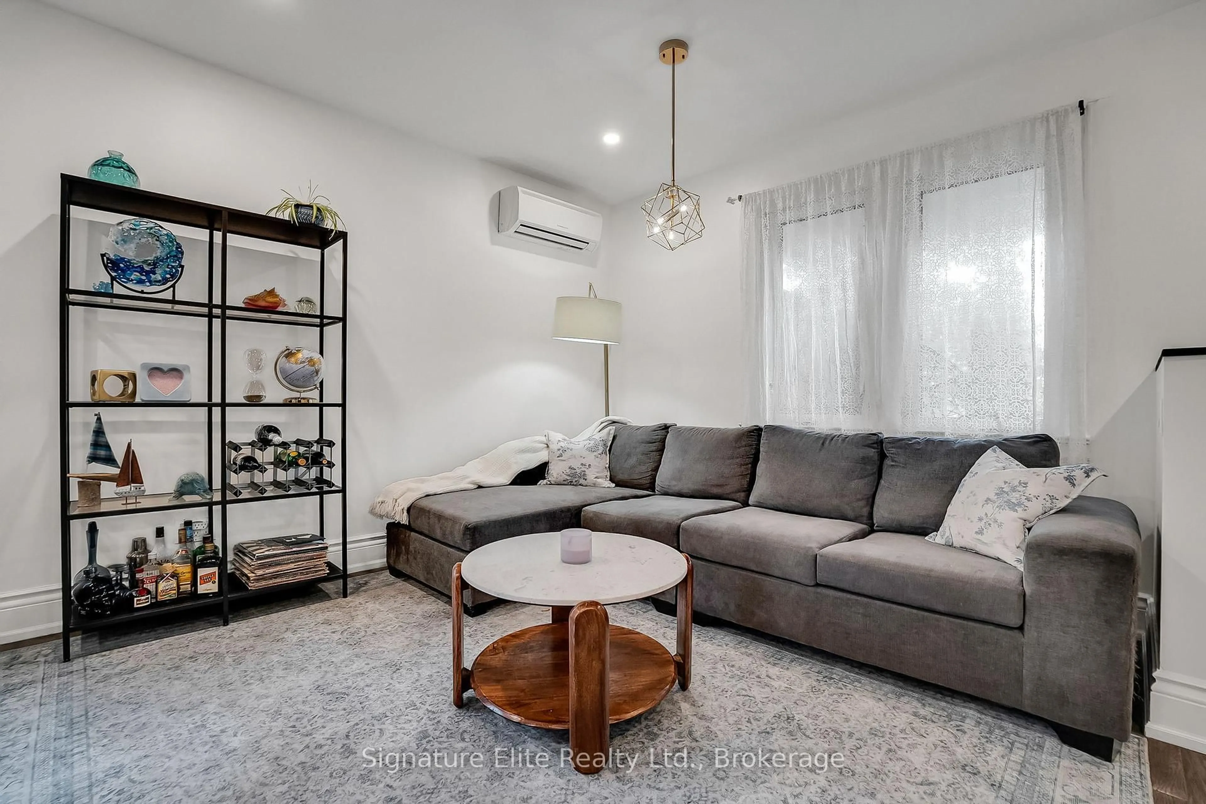 Living room with furniture, unknown for 184 Swanwick Ave, Toronto Ontario M4E 2A6
