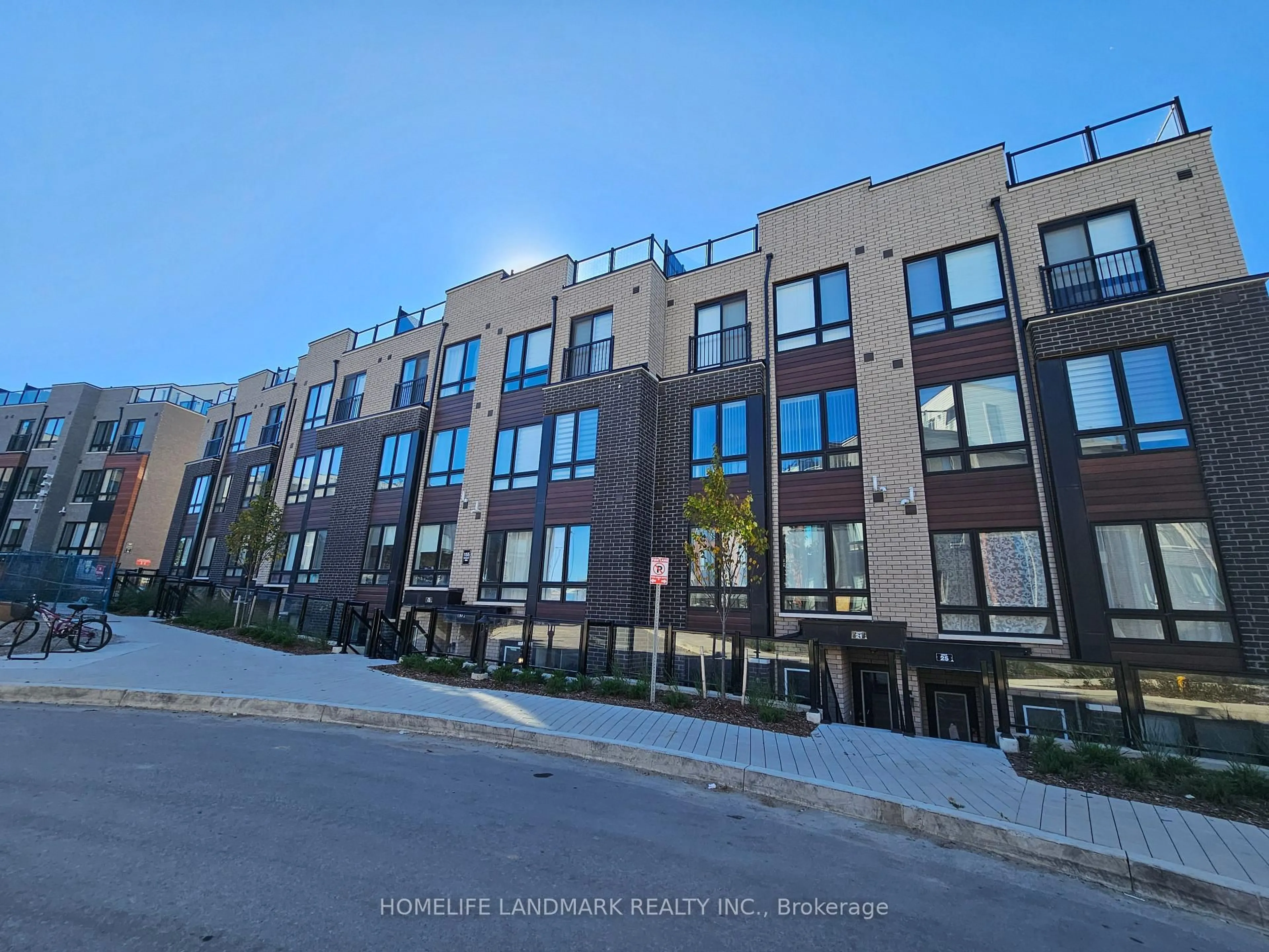 A pic from outside/outdoor area/front of a property/back of a property/a pic from drone, street for 155 Tapscott Rd #5, Toronto Ontario M1B 0E8