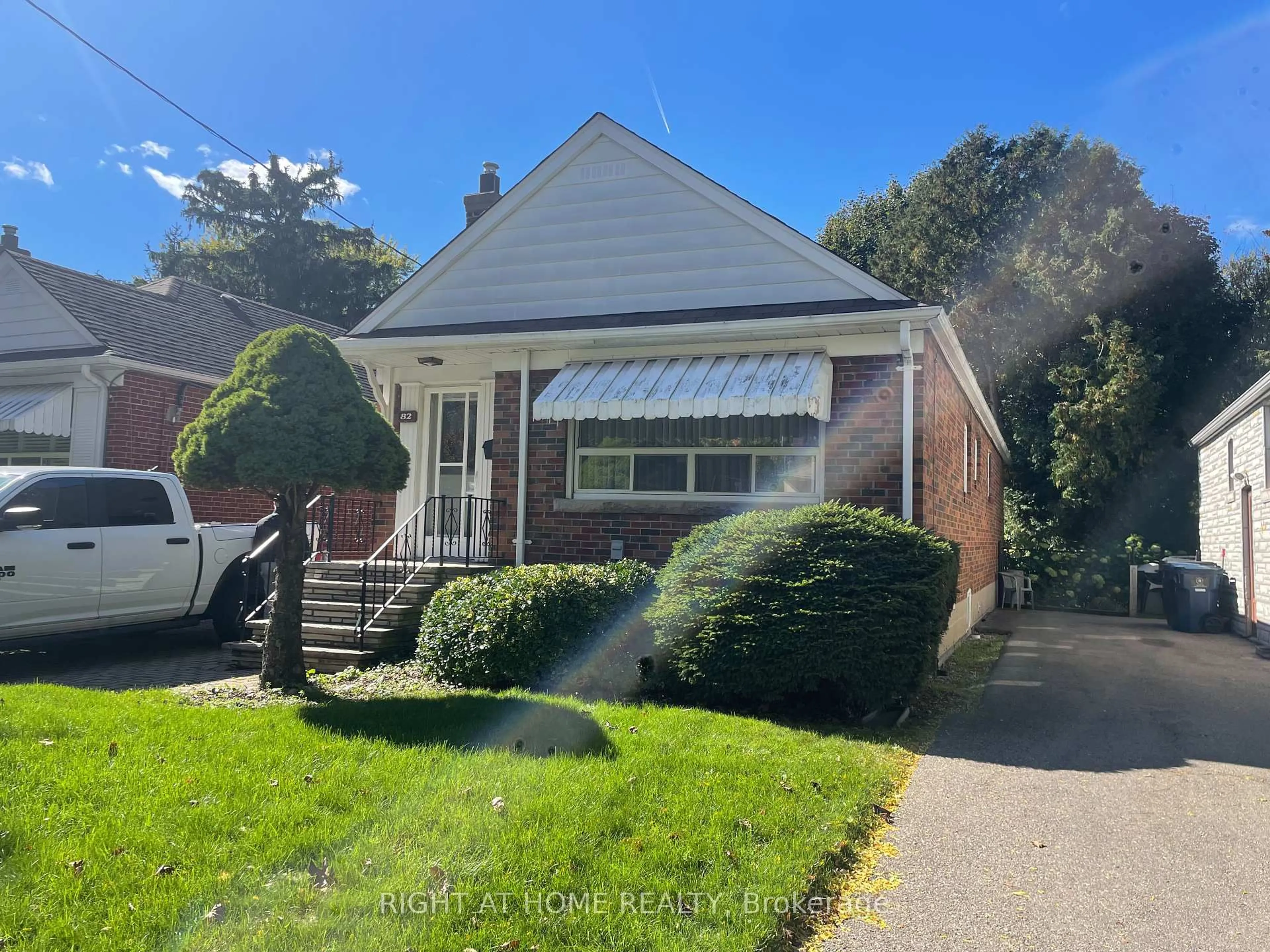 Home with brick exterior material, street for 82 Cedarcrest Blvd, Toronto Ontario M4B 2P3