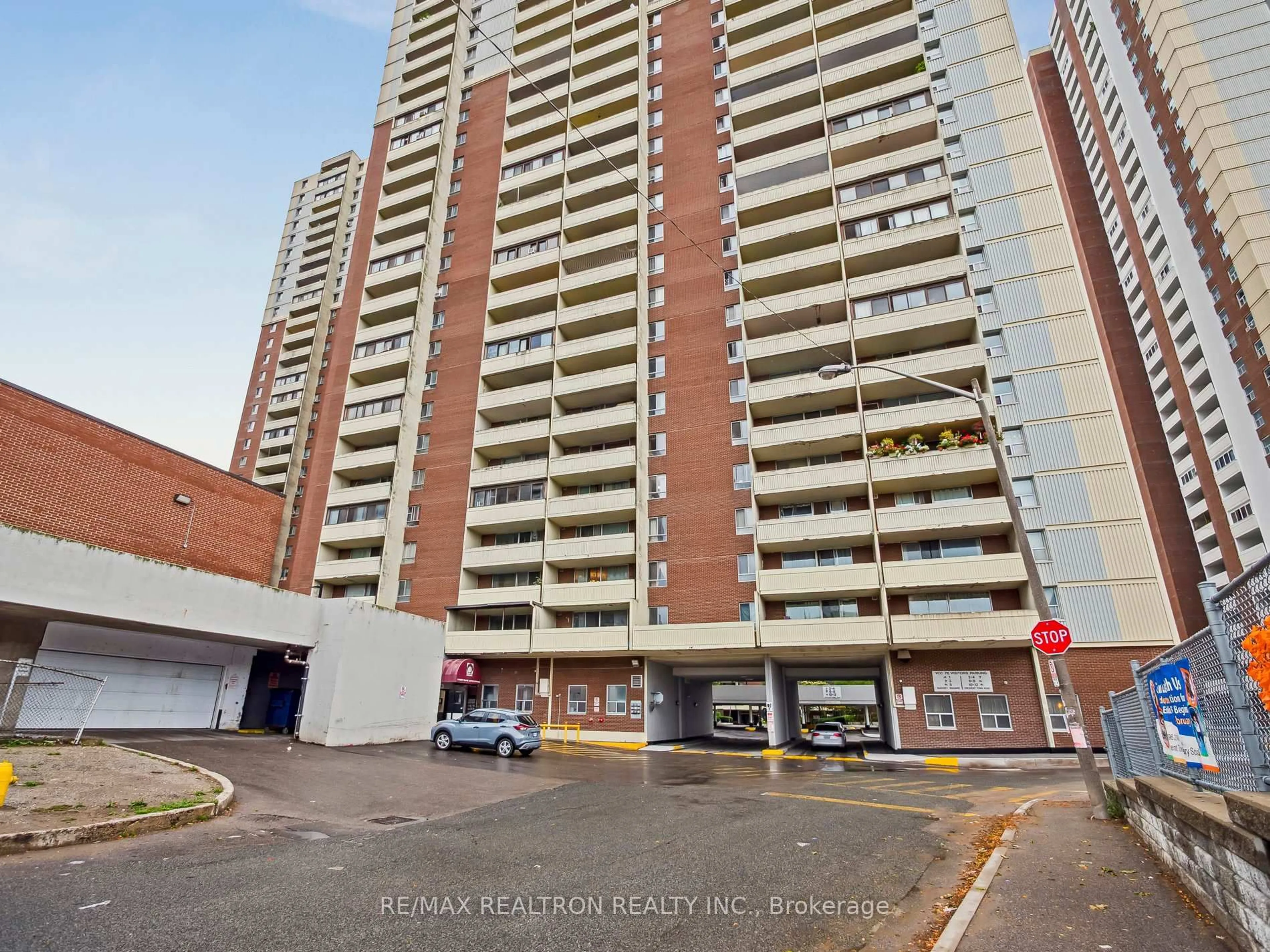 A pic from outside/outdoor area/front of a property/back of a property/a pic from drone, street for 5 Massey Sq #502, Toronto Ontario M4C 5L6
