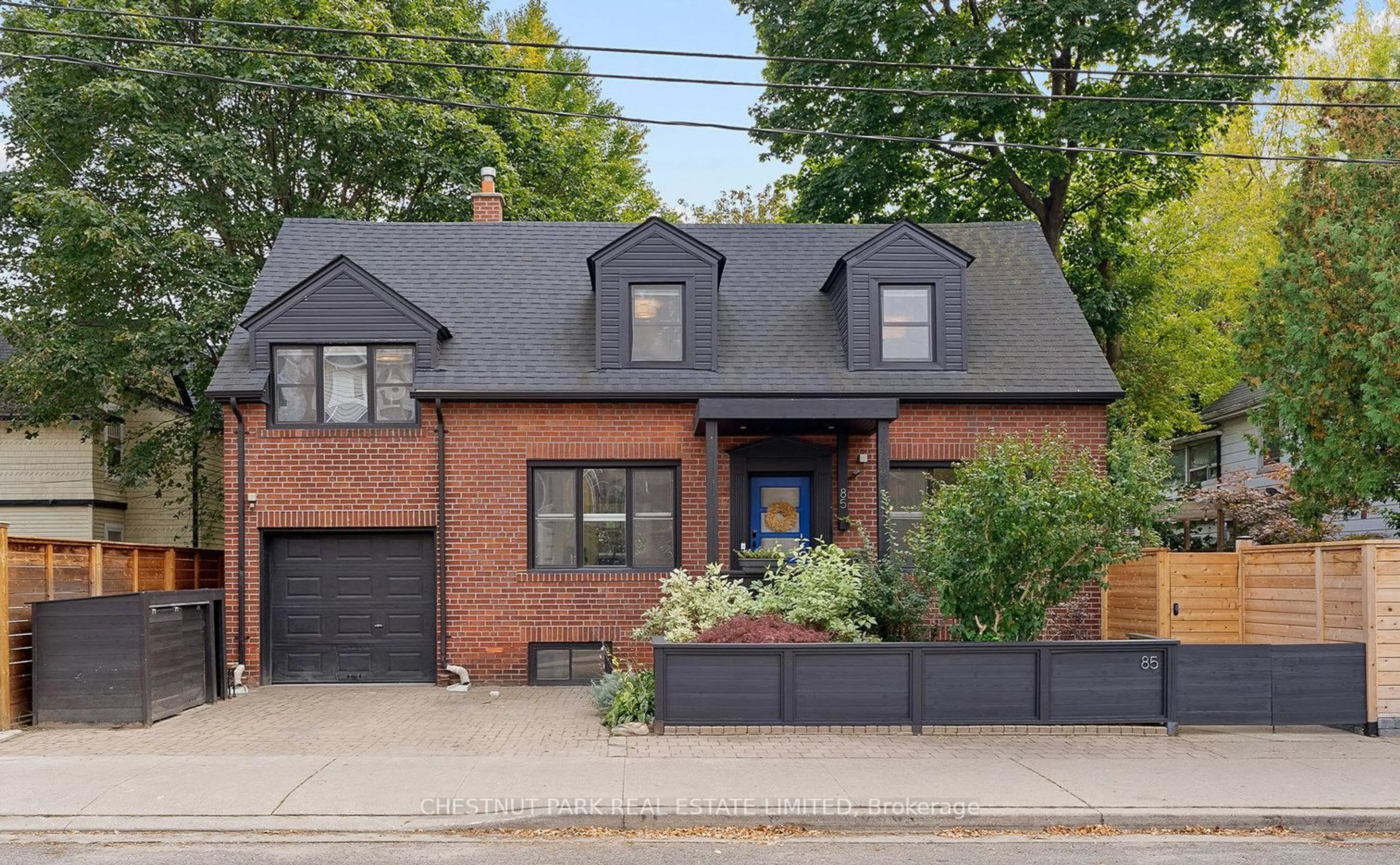 Home with brick exterior material, street for 85 Eastwood Rd, Toronto Ontario M4L 2C7