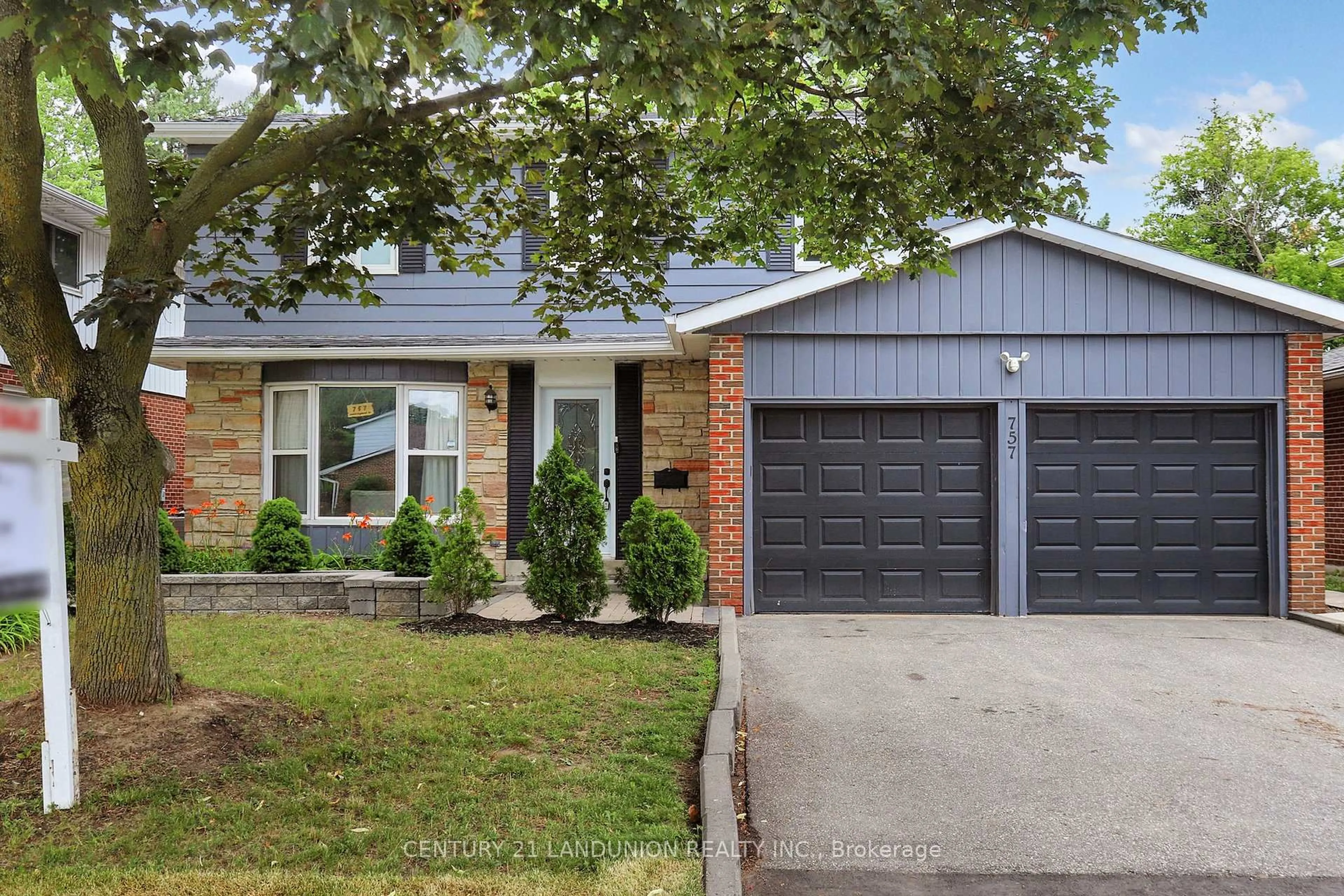 Home with brick exterior material, street for 757 Huntingwood Dr, Toronto Ontario M1T 2L3