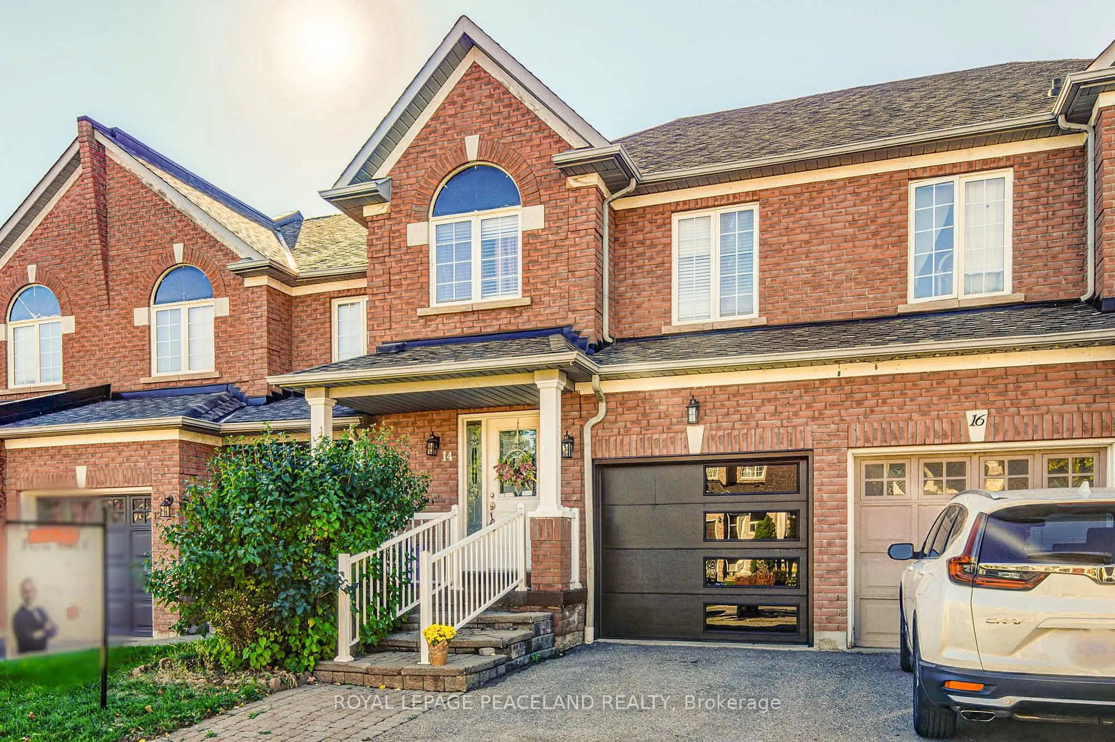 Home with brick exterior material, street for 14 Oglevie Dr, Whitby Ontario L1R 2Y4
